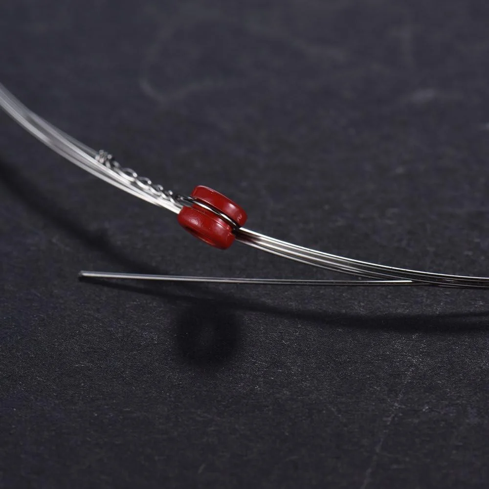 سیم های تکی سری TX-2، جایگزین سیم دوم B گیتار آکوستیک (0.014) بسته 10 عددی، هسته فولادی پرکربن، فسفر برنز 75/25، کشش فوق العاده سبک