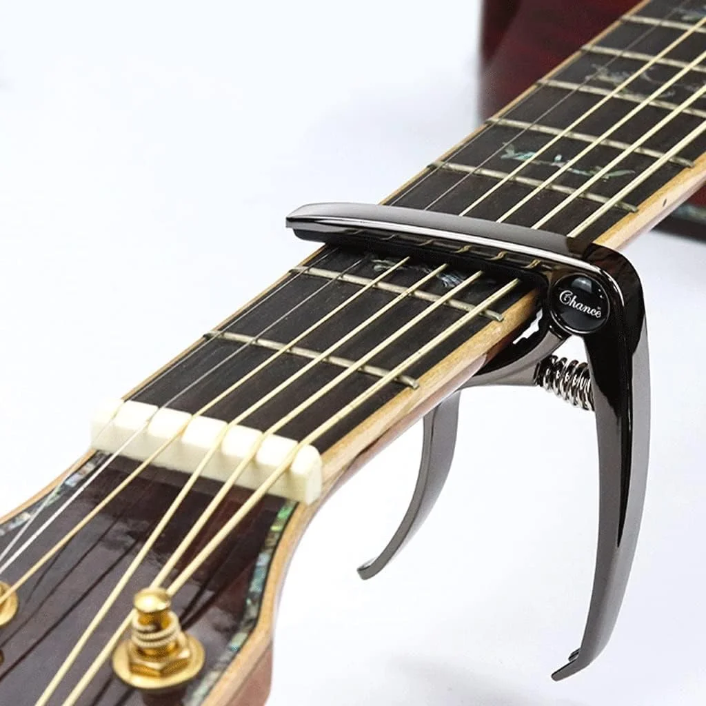 گیره تعویض سیم گیتار آکوستیک فولک ZXM، مناسب برای گیتار الکتریک و کلاسیک، چند منظوره (رنگ: مشکی) گیره تعویض سیم گیتار آکوستیک فولک ZXM، مناسب برای گیتار الکتریک و کلاسیک، چند منظوره (رنگ: مشکی)