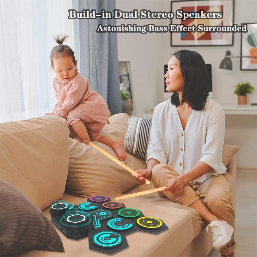 ست درام الکترونیکی قابل حمل نورسیکس، پد درام تاشو با بلندگوهای استریو داخلی، 2 پدال پا، چوب درام، 9 پد سیلیکونی قابل شارژ برای کودکان و بزرگسالان مبتدی ست درام الکترونیکی قابل حمل نورسیکس، پد درام تاشو با بلندگوهای استریو داخلی، 2 پدال پا، چوب درام، 9 پد سیلیکونی قابل شارژ برای کودکان و بزرگسالان مبتدی