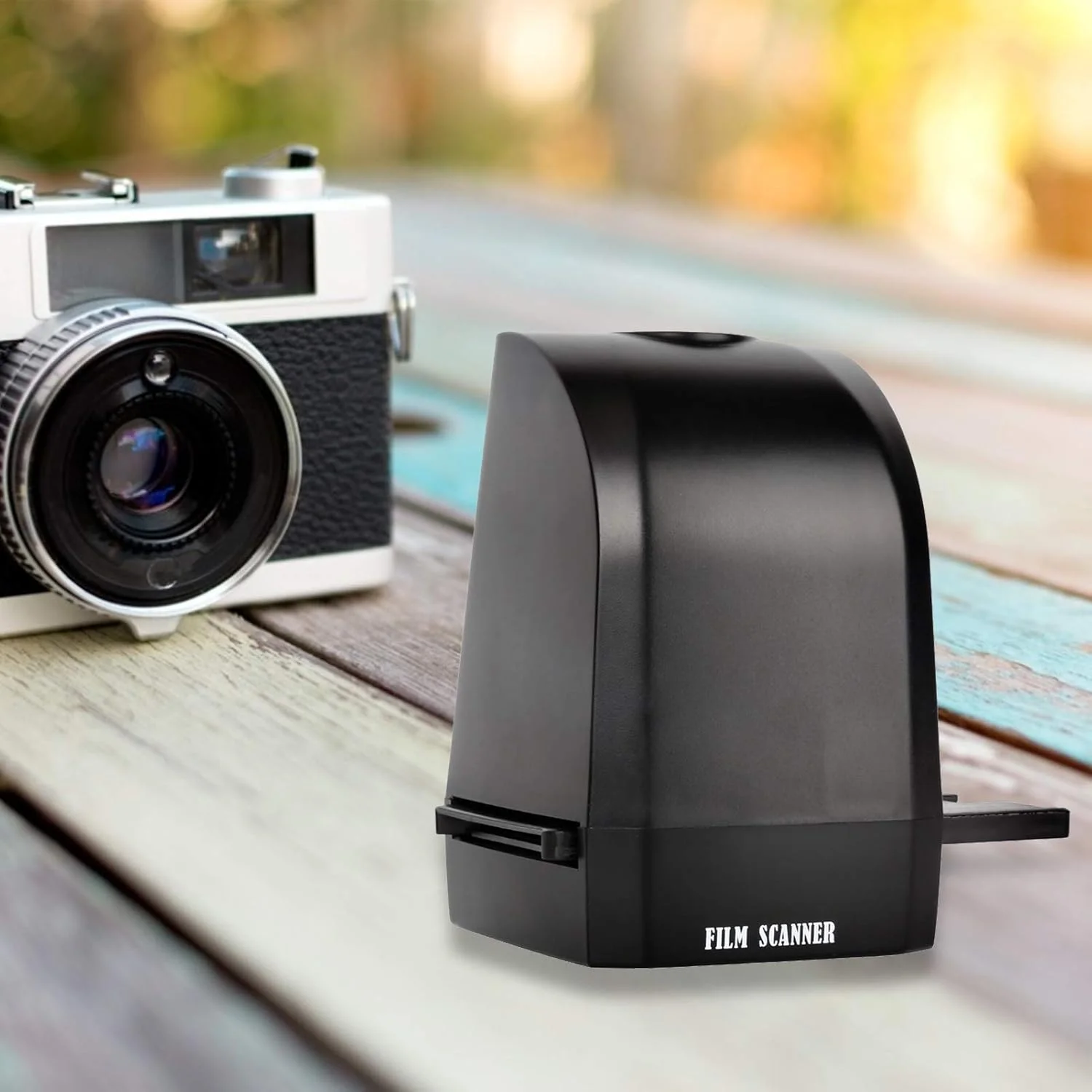 اسکنر اسلاید فیلم ۱۳۵ قابل حمل ۸ مگاپیکسل CMOS تبدیل اسلایدهای ۳۵ میلیمتری و ۱۳۵ میلیمتری نگاتیو به عکسهای دیجیتال JPEG با قابلیت اسکن، حذف، آینه، چرخش، ذخیره، تنظیم رنگ و روشنایی ۲۴۰۰dpi 4800dpi اسکنر اسلاید فیلم ۱۳۵ قابل حمل ۸ مگاپیکسل CMOS تبدیل اسلایدهای ۳۵ میلیمتری و ۱۳۵ میلیمتری نگاتیو به عکسهای دیجیتال JPEG با قابلیت اسکن، حذف، آینه، چرخش، ذخیره، تنظیم رنگ و روشنایی ۲۴۰۰dpi 4800dpi