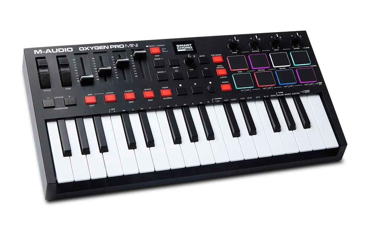 M-Audio Oxygen Pro Mini, 32 Key USB MIDI Keyboard Controller With Beat Pads, MIDI assignable Knobs, Buttons & Faders and Software Suite Included | OXYGENPROMINI