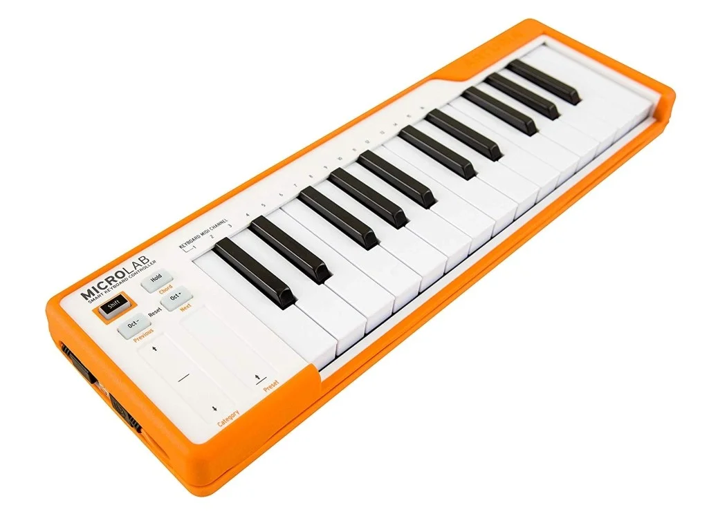کنترلر USB-MIDI جمع و جور Arturia MicroLab، 25 کلید مینی حساس به ضربه، دکمه های اکتاو بالا/پایین، دکمه Hold (Sustain) + عملکرد آکورد، نارنجی | 230513 کنترلر USB-MIDI جمع و جور Arturia MicroLab، 25 کلید مینی حساس به ضربه، دکمه های اکتاو بالا/پایین، دکمه Hold (Sustain) + عملکرد آکورد، نارنجی | 230513