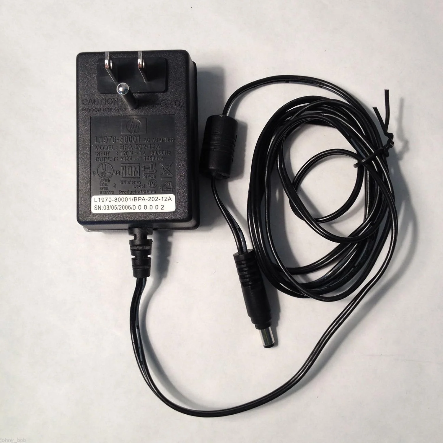 آداپتور برق اصلی HP مدل BPA-202-12A، دوازده ولت، هزار و دویست و پنجاه میلی آمپر، مدل L1970-80001 آداپتور برق اصلی HP مدل BPA-202-12A، دوازده ولت، هزار و دویست و پنجاه میلی آمپر، مدل L1970-80001