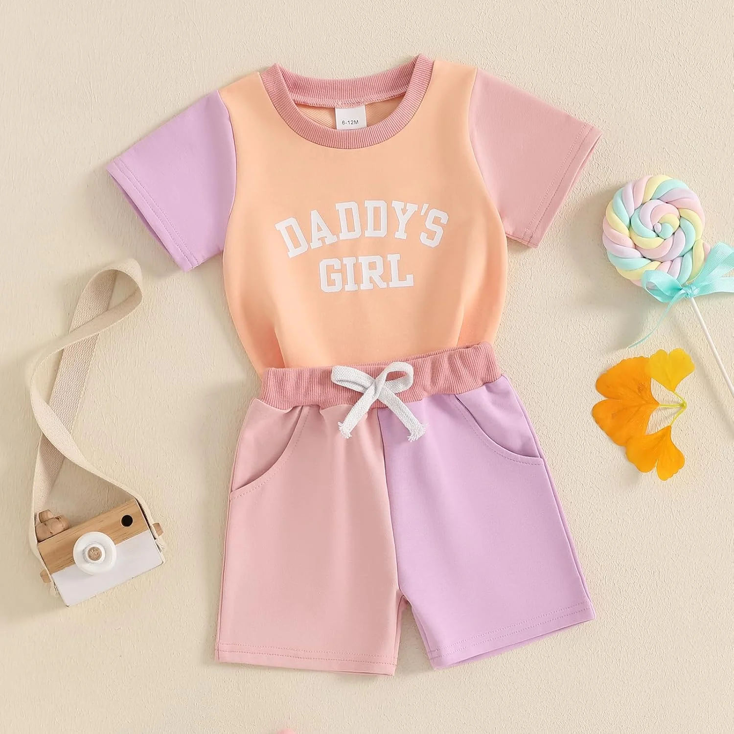 ست لباس تابستانی دخترانه شامل تیشرت آستین کوتاه طرح دار و شلوارک کشی