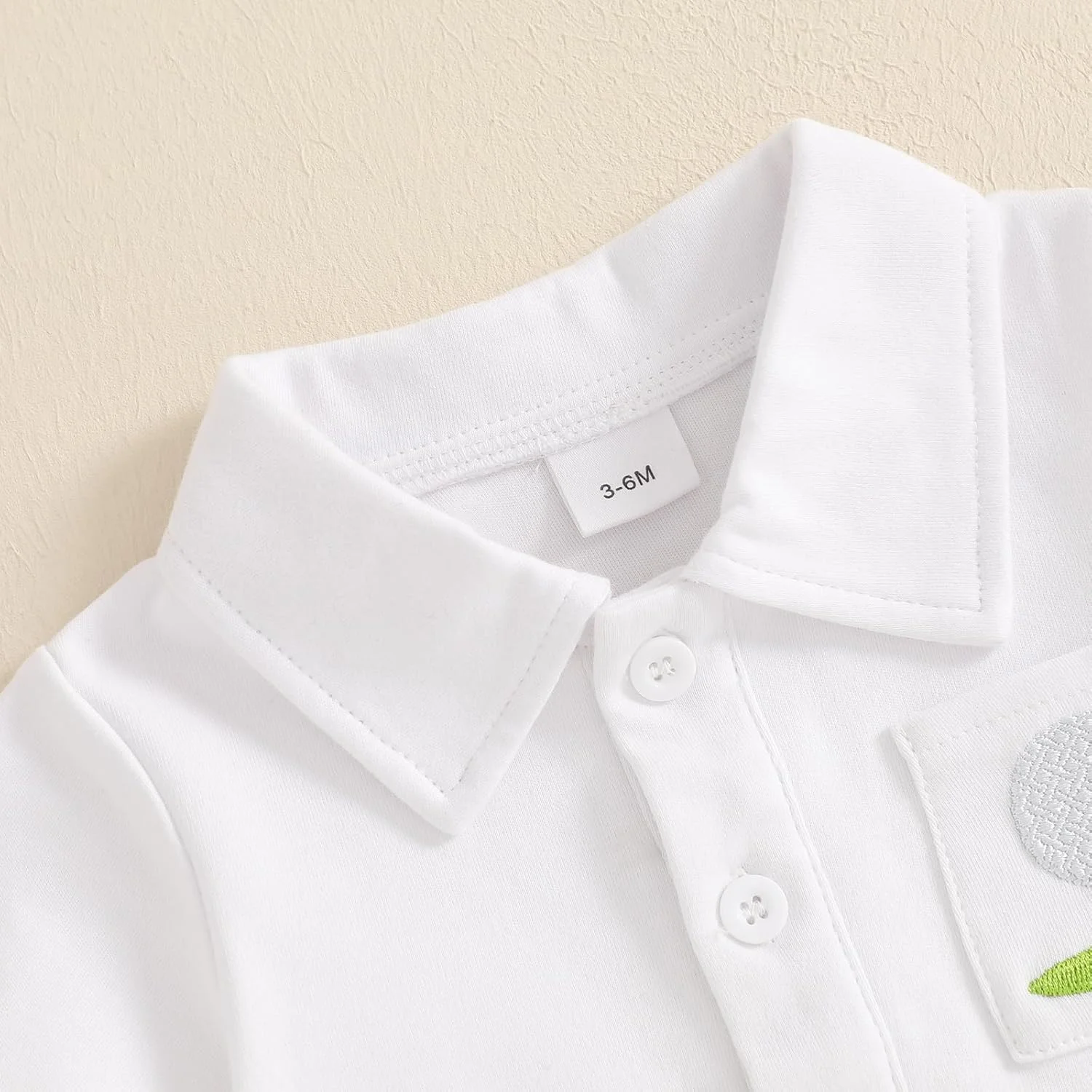 لباس تابستانی پسرانه، تیشرت پولو آستین کوتاه با گلدوزی طرح گلف به همراه شلوارک طرح دار - ست لباس زیبا