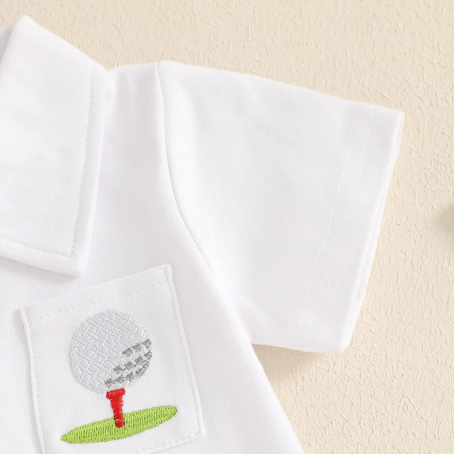 لباس تابستانی پسرانه، تیشرت پولو آستین کوتاه با گلدوزی طرح گلف به همراه شلوارک طرح دار - ست لباس زیبا