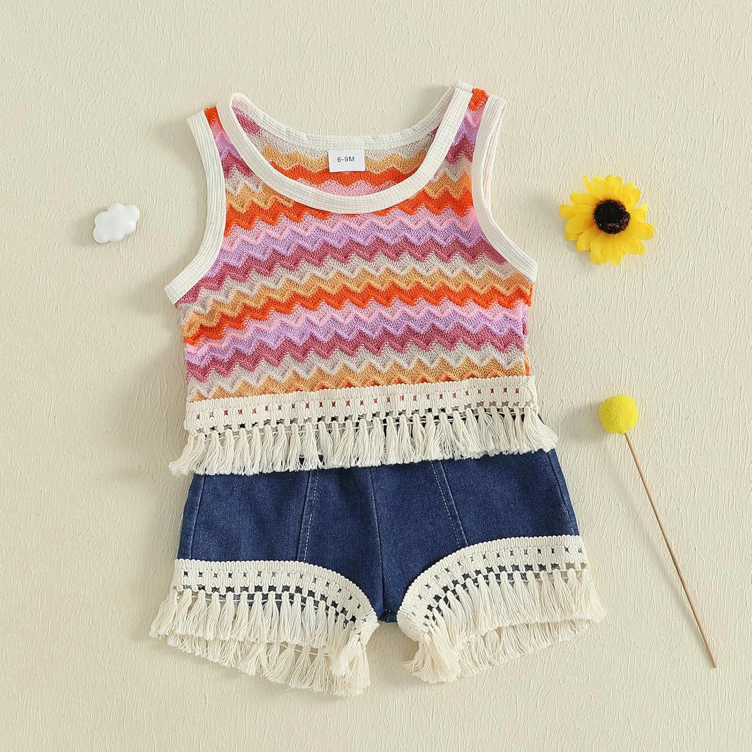 ست لباس تابستانی دخترانه شامل تاپ بدون آستین راه راه با حاشیه منگوله دار و شورت جین ست لباس تابستانی دخترانه شامل تاپ بدون آستین راه راه با حاشیه منگوله دار و شورت جین