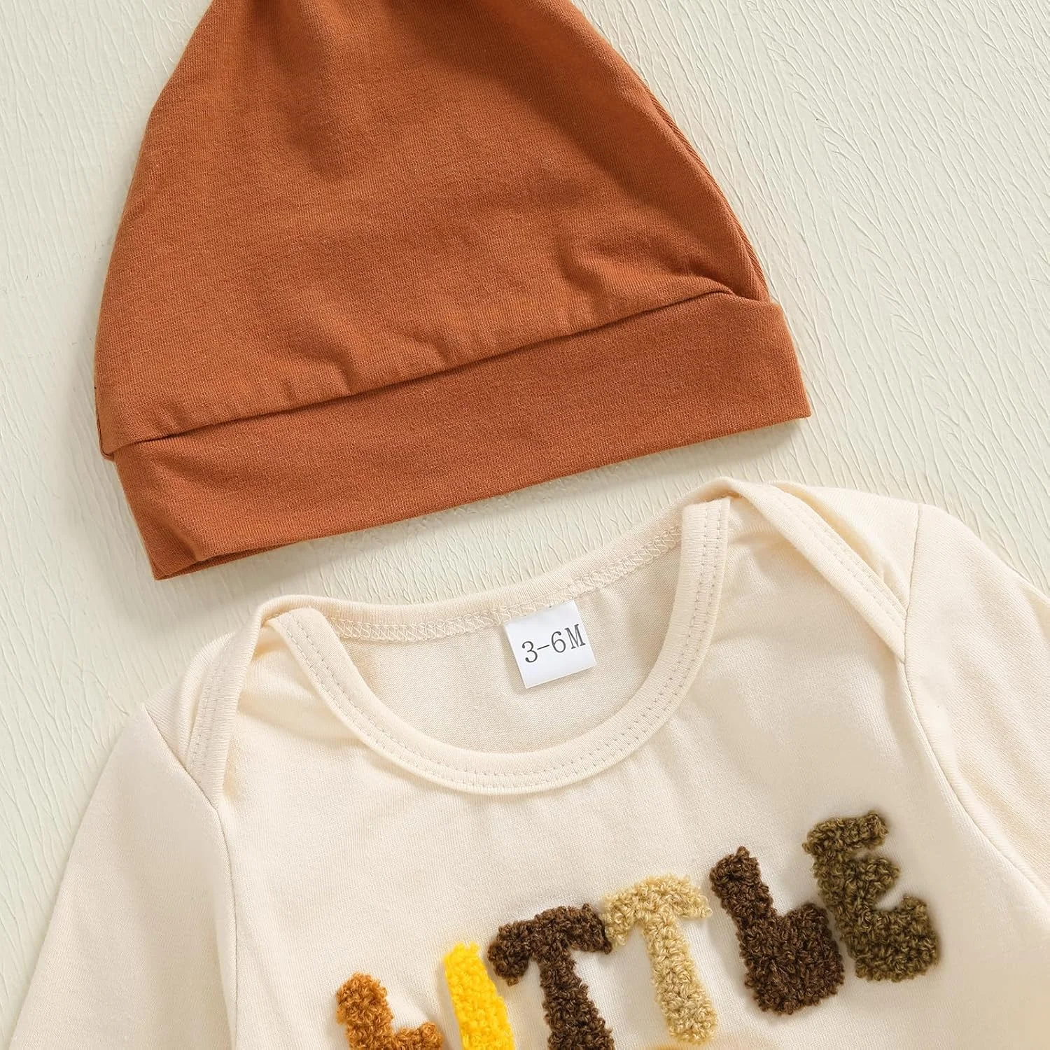 لباس نوزادی پسرانه برای جشن شکرگزاری، ست لباس شامل سرهمی، شلوار و کلاه با طرح بوقلمون