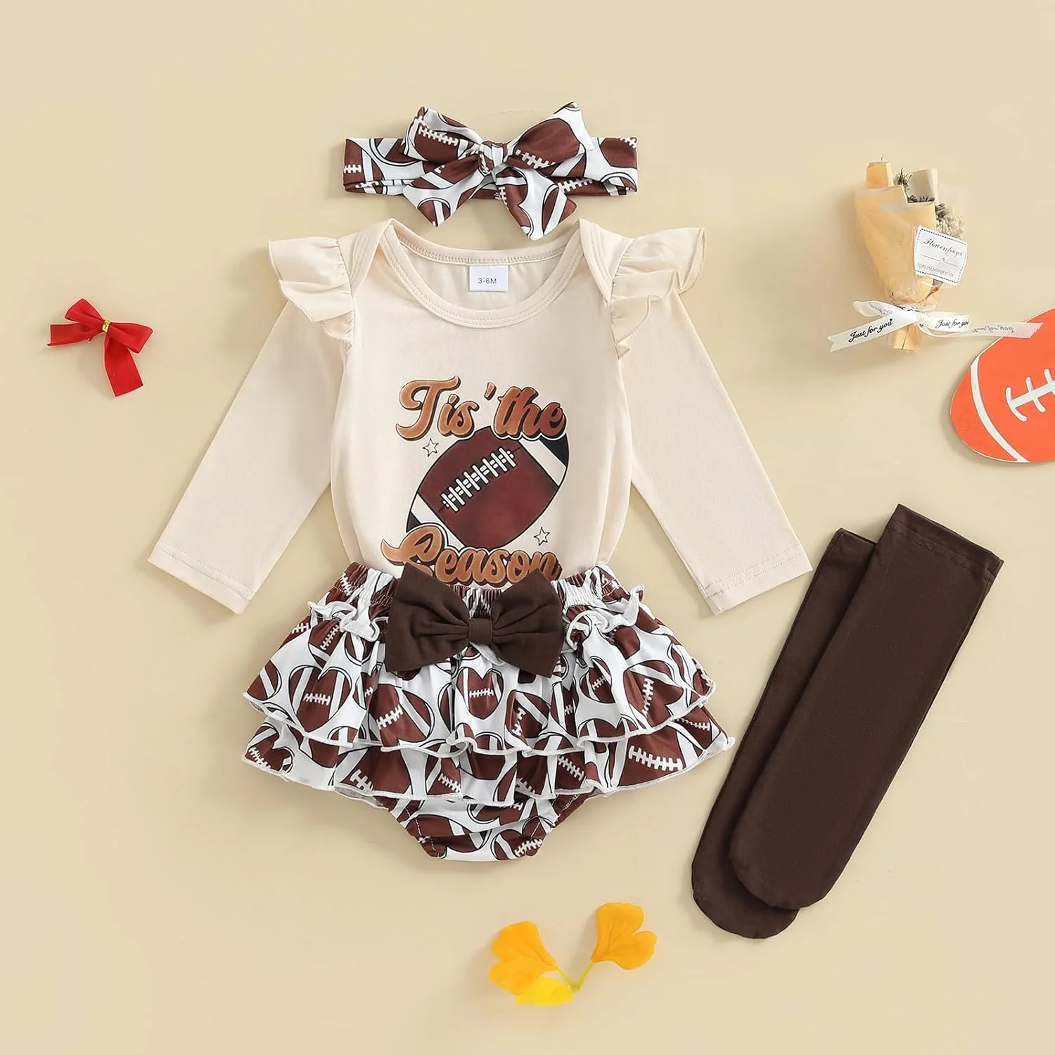 لباس نوزاد دخترانه فوتبالی، سرهمی آستین بلند با چاپ حروف، شورت چین دار، هدبند و جوراب ساق بلند، ست 4 تکه لباس روز بازی