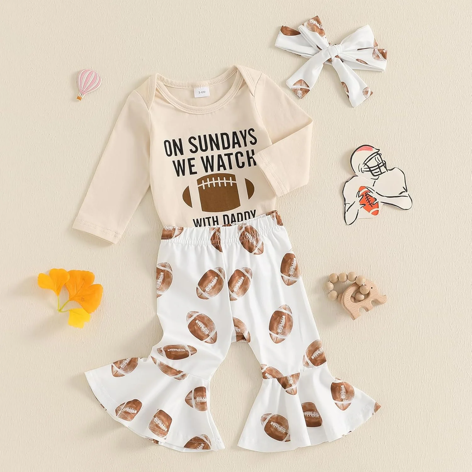 ست لباس نوزاد دخترانه شامل سرهمی آستین بلند با طرح حروف، شلوار دمپا گشاد طرح توپ و هدبند