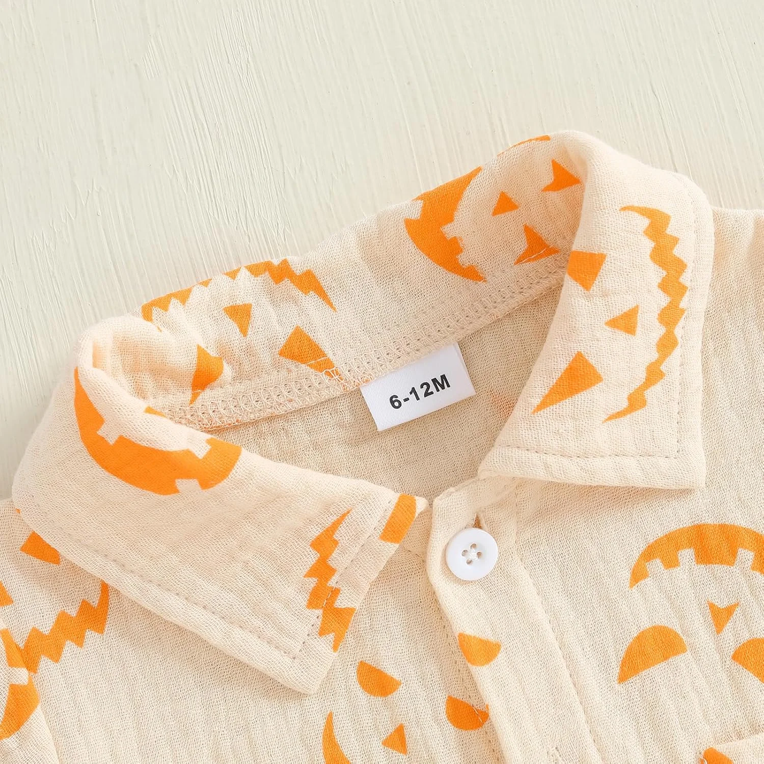 ست لباس خواب بچه گانه طرح کدو تنبل، پیراهن آستین بلند دکمه دار و شلوار