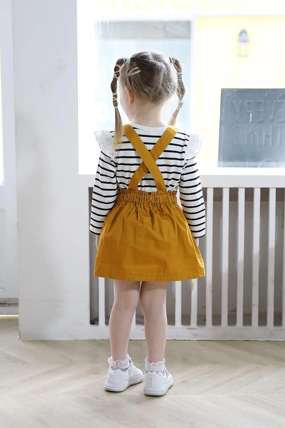 ست لباس 3 تکه دخترانه شامل رامپر، بلوز و دامن گلدار ست لباس 3 تکه دخترانه شامل رامپر، بلوز و دامن گلدار