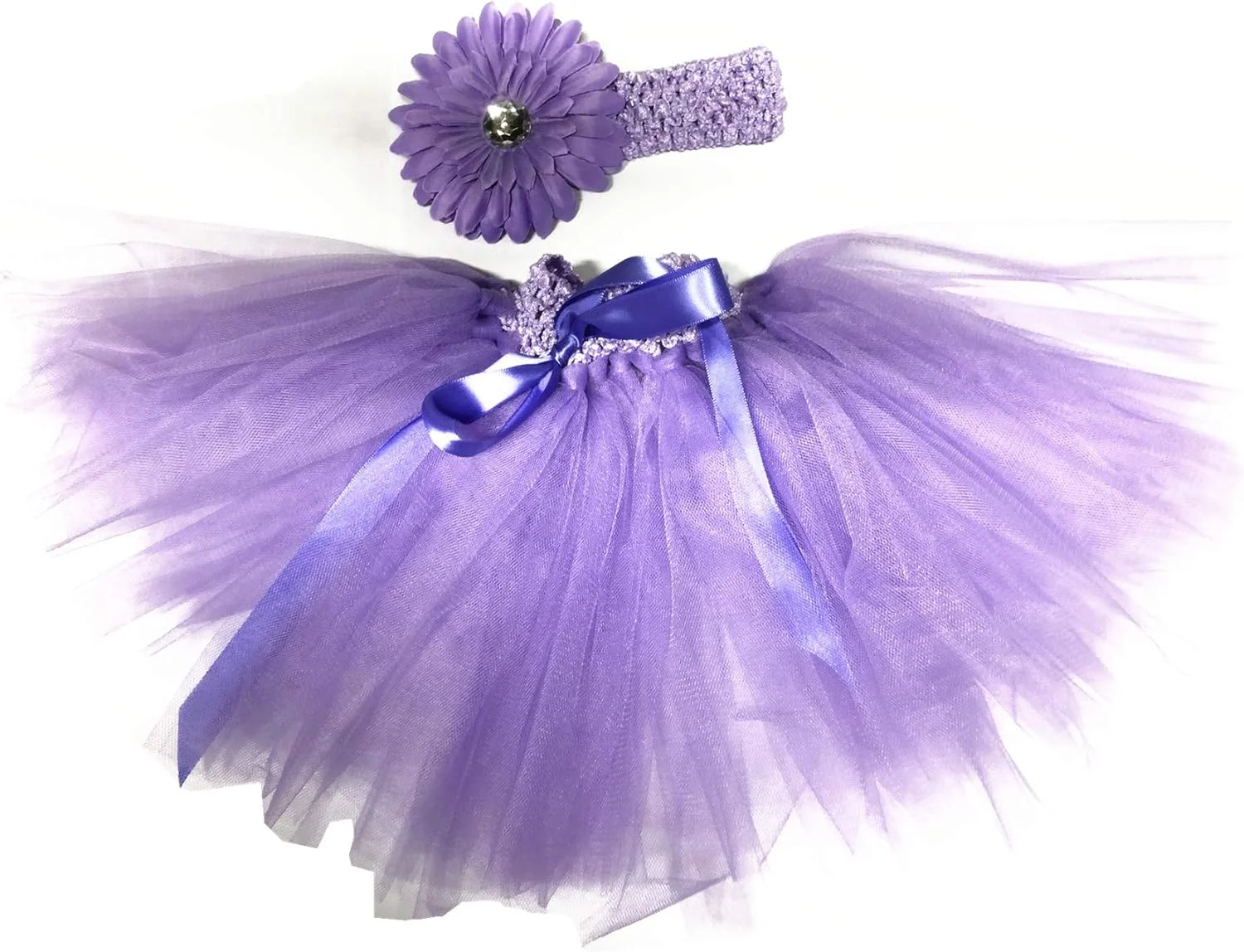 لباس تولد نوزاد دخترانه شامل دامن توری چند لایه و گل سر