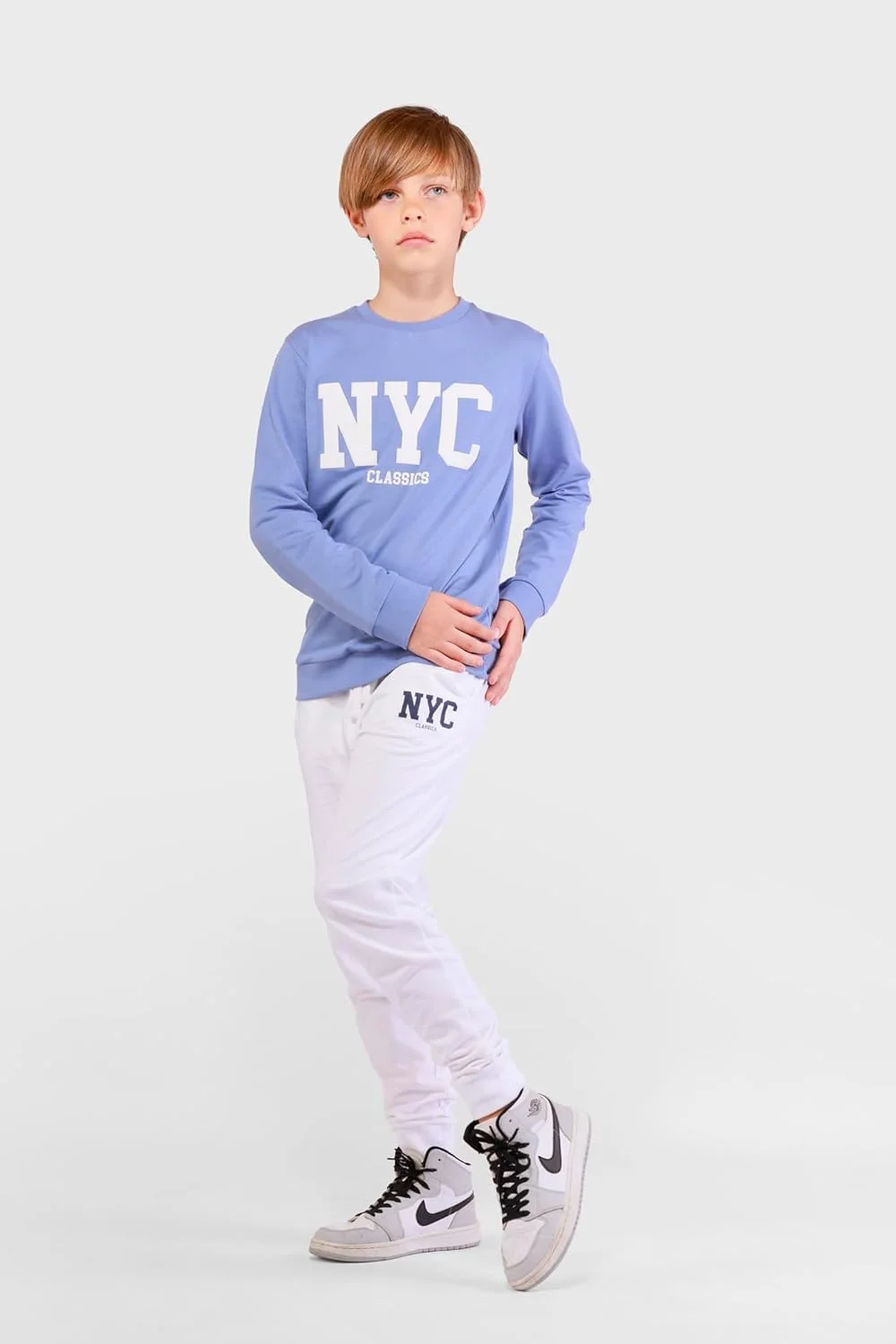 ست لباس پسرانه طرح‌دار نخی Nuego، شامل بلوز آستین بلند و شلوار جاگر، مناسب برای پسران 7 تا 14 سال (آبی، سفید)