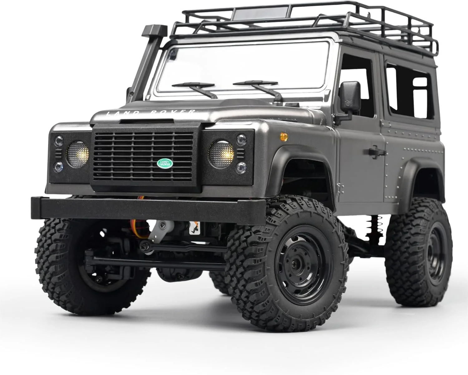 ماشین کنترلی صخره نورد آفرود لندرور دیفندر ۹۰، مقیاس ۱/۱۲، با کنترل از راه دور، مناسب برای افراد بالای ۱۶ سال ماشین کنترلی صخره نورد آفرود لندرور دیفندر ۹۰، مقیاس ۱/۱۲، با کنترل از راه دور، مناسب برای افراد بالای ۱۶ سال