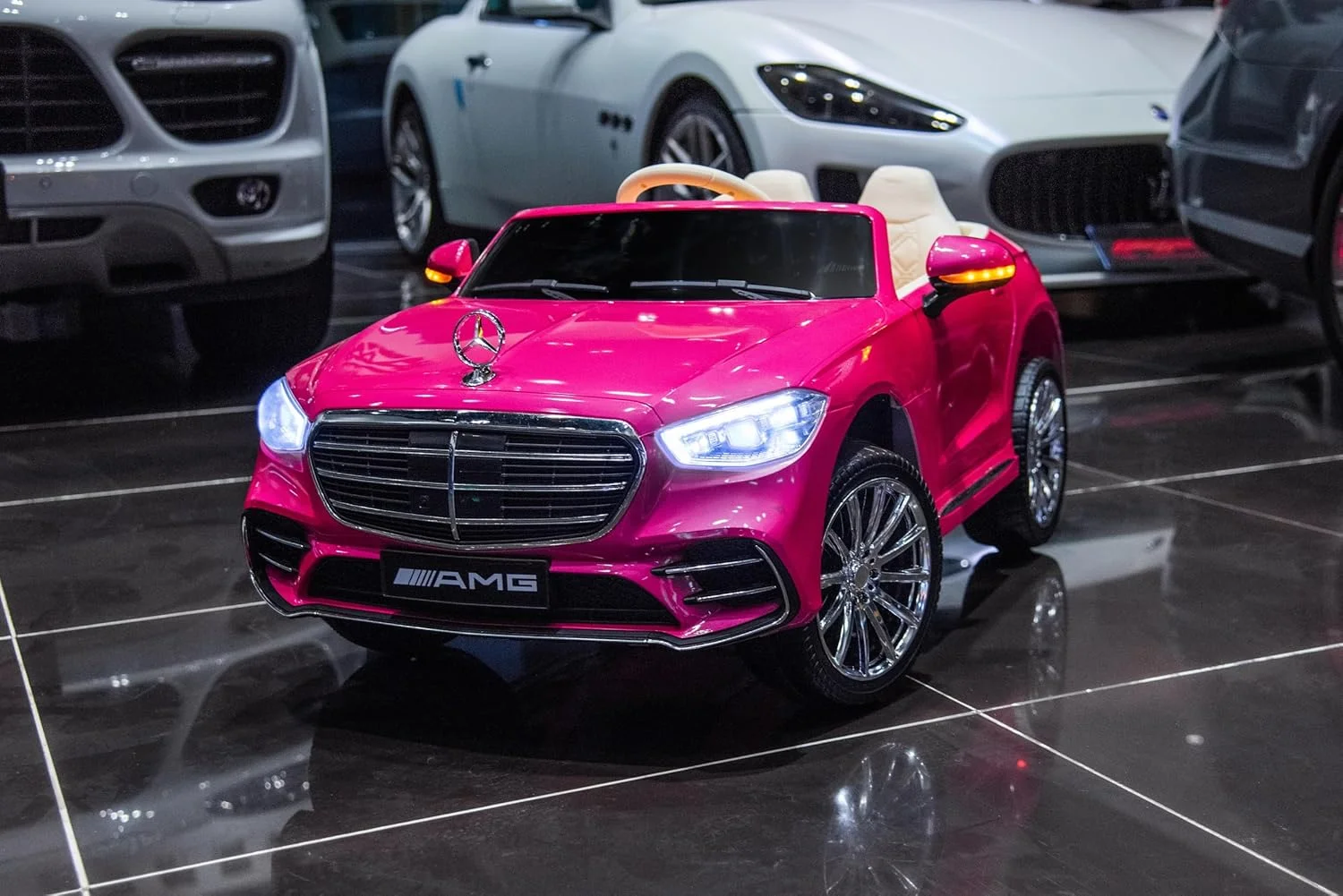 ماشین سواری شارژی کودک مدل LB 6050EL با چراغ های LED، موسیقی، USB، بلوتوث و صندلی چرمی - وسیله نقلیه برقی برای کودکان نوپا و خردسالان (100% مونتاژ شده، صورتی)