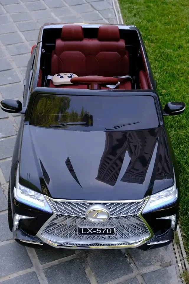 ماشین بازی کودکانه دورسا مدل لکسوس LX570 با باتری 12 ولت، موزیک، صدا و نور | صندلی چرمی، لاستیک های رابر، مناسب برای رنج سنی 2 تا 8 سال (مشکی) ماشین بازی کودکانه دورسا مدل لکسوس LX570 با باتری 12 ولت، موزیک، صدا و نور | صندلی چرمی، لاستیک های رابر، مناسب برای رنج سنی 2 تا 8 سال (مشکی)