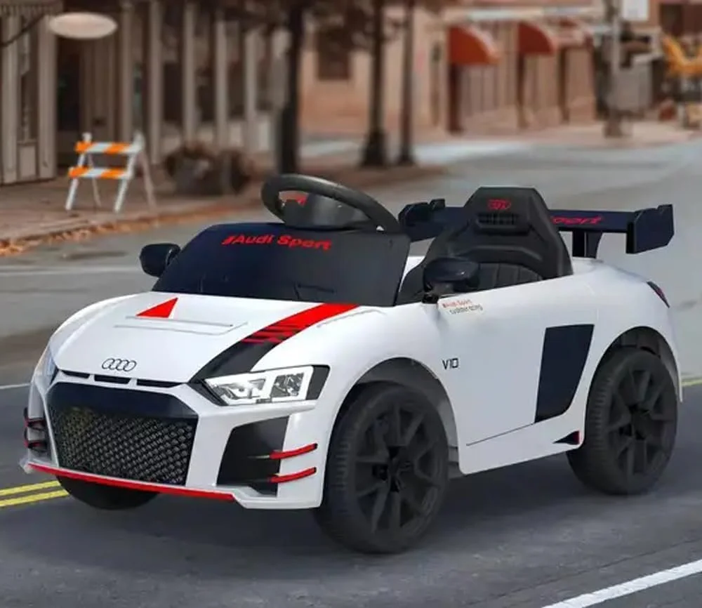 ماشین سواری کودکانه آئودی اسپرت دورسا با باتری 12 ولت، ماشین بازی کودکانه با موسیقی، صدا و نور | ماشین سواری برقی کودکانه مناسب برای رده سنی 2 تا 5 سال (سفید)