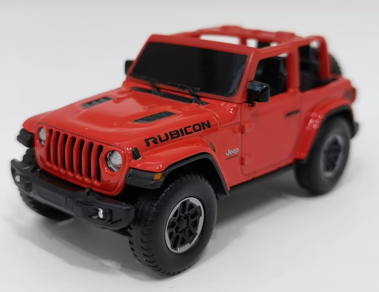 RASTAR 59000 ماشین اسباب بازی جیپ فلزی دایکست 1/43 - مدل دایکست جیپ رانگلر روبیکون با مجوز رسمی برای بازی و نمایش - هدیه ای ایده آل برای کودکان - قرمز