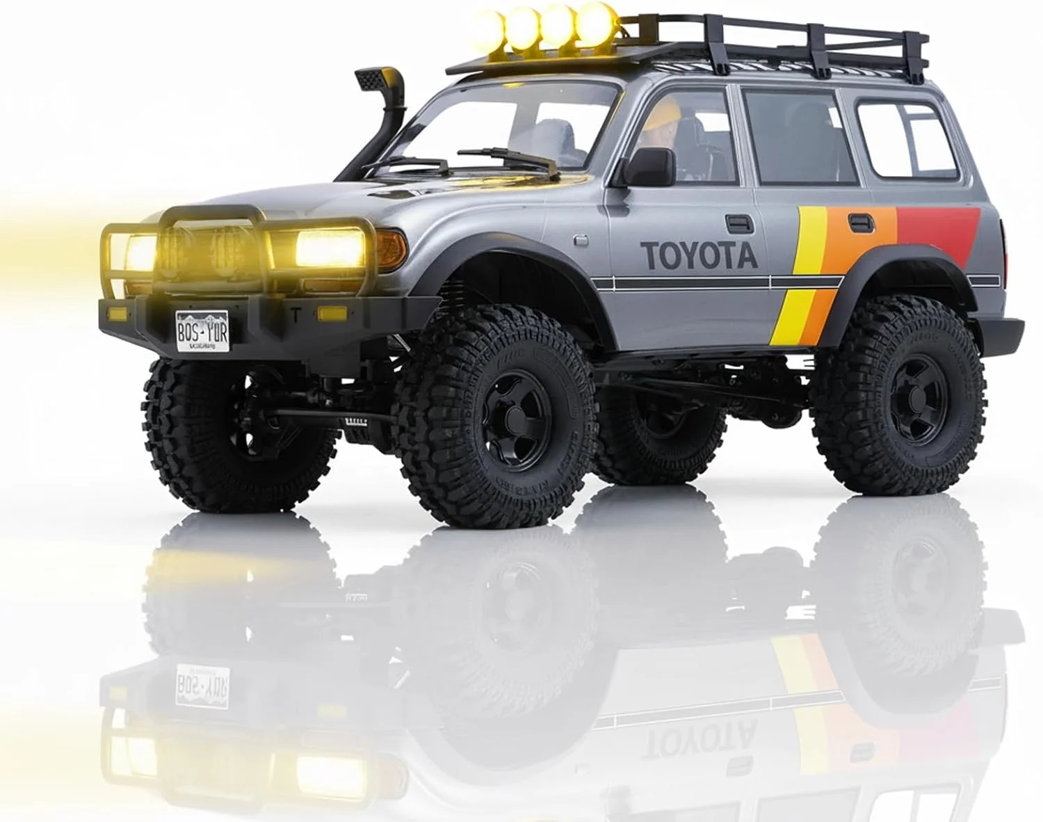ماشین کنترلی صخره نورد EAZYRC FMS FCX10 مقیاس 1/10 مدل لندکروزر 80 - دارای مجوز رسمی تویوتا، ماشین کنترلی صخره نورد 4X4 با عملکرد بالا، دارای گیربکس دو سرعته، شاسی فلزی، چراغ های LED واقعی، ماشین کنترلی 2.4 گیگاهرتز برای بزرگسالان