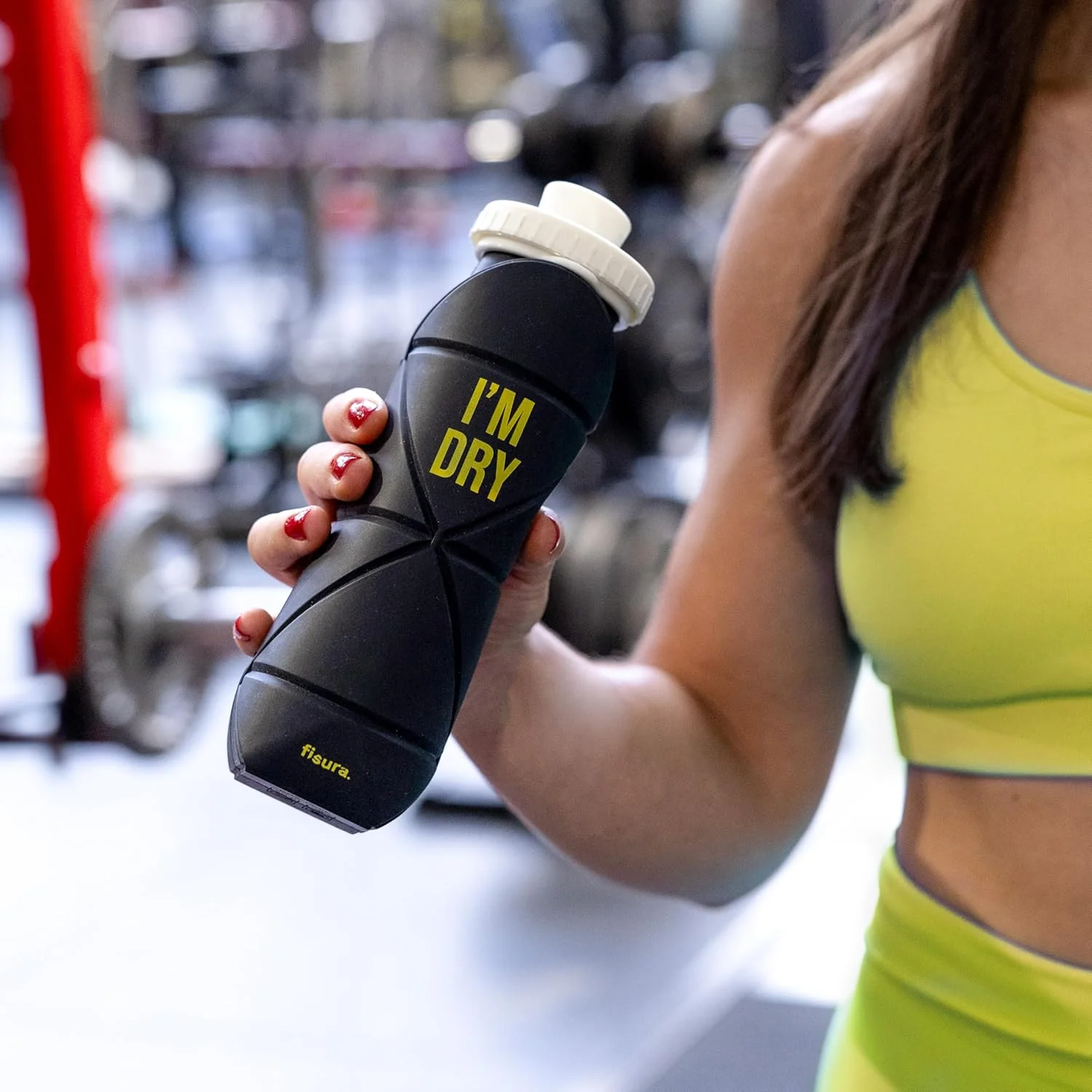 فیسورا - قمقمه تاشو «من خشکم». قمقمه تاشو سیلیکونی انعطاف پذیر بدون BPA، مشکی و زرد. ظرفیت 600 میلی لیتر