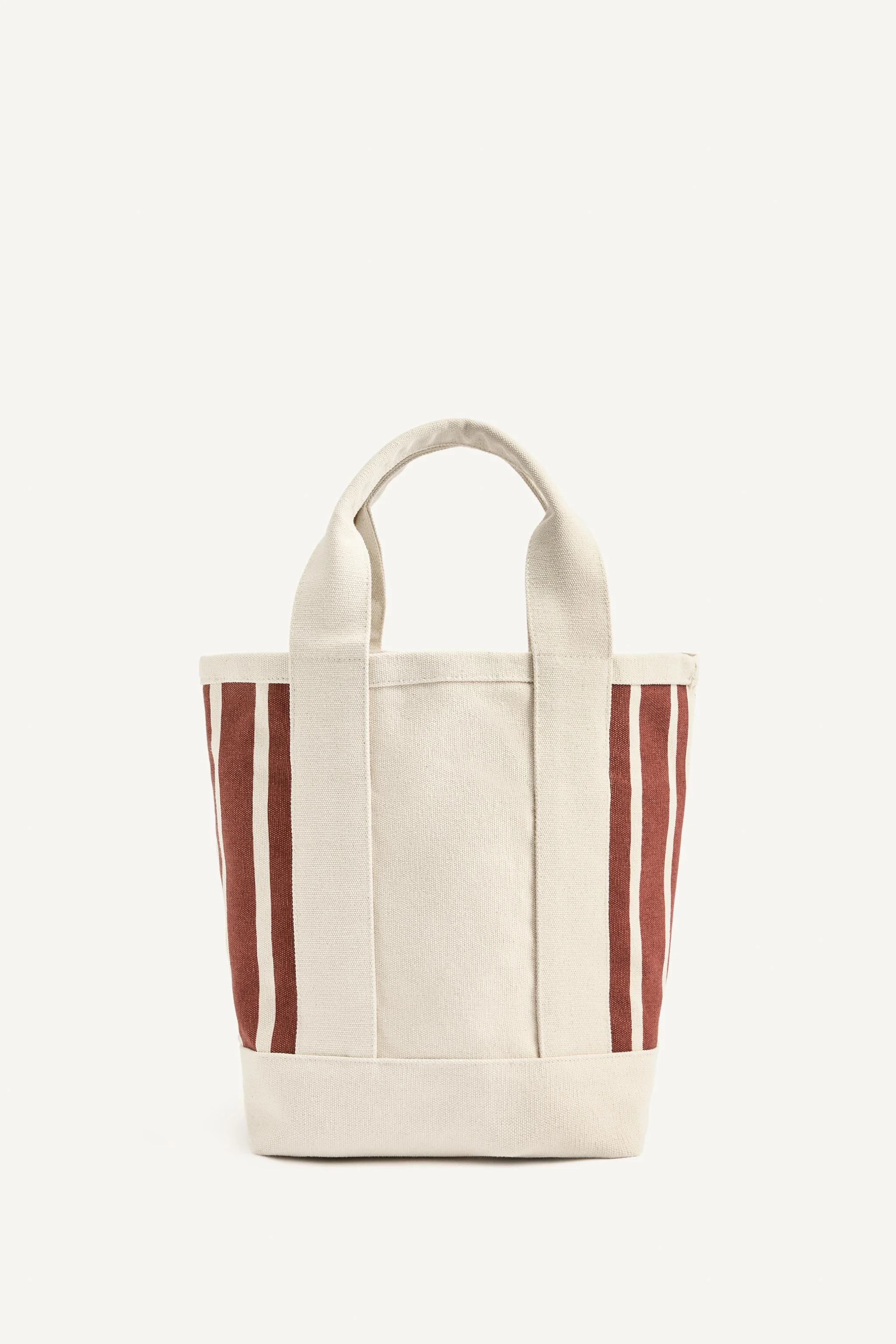 کیف خرید با طرح راه راه. دارای جیب های داخلی.