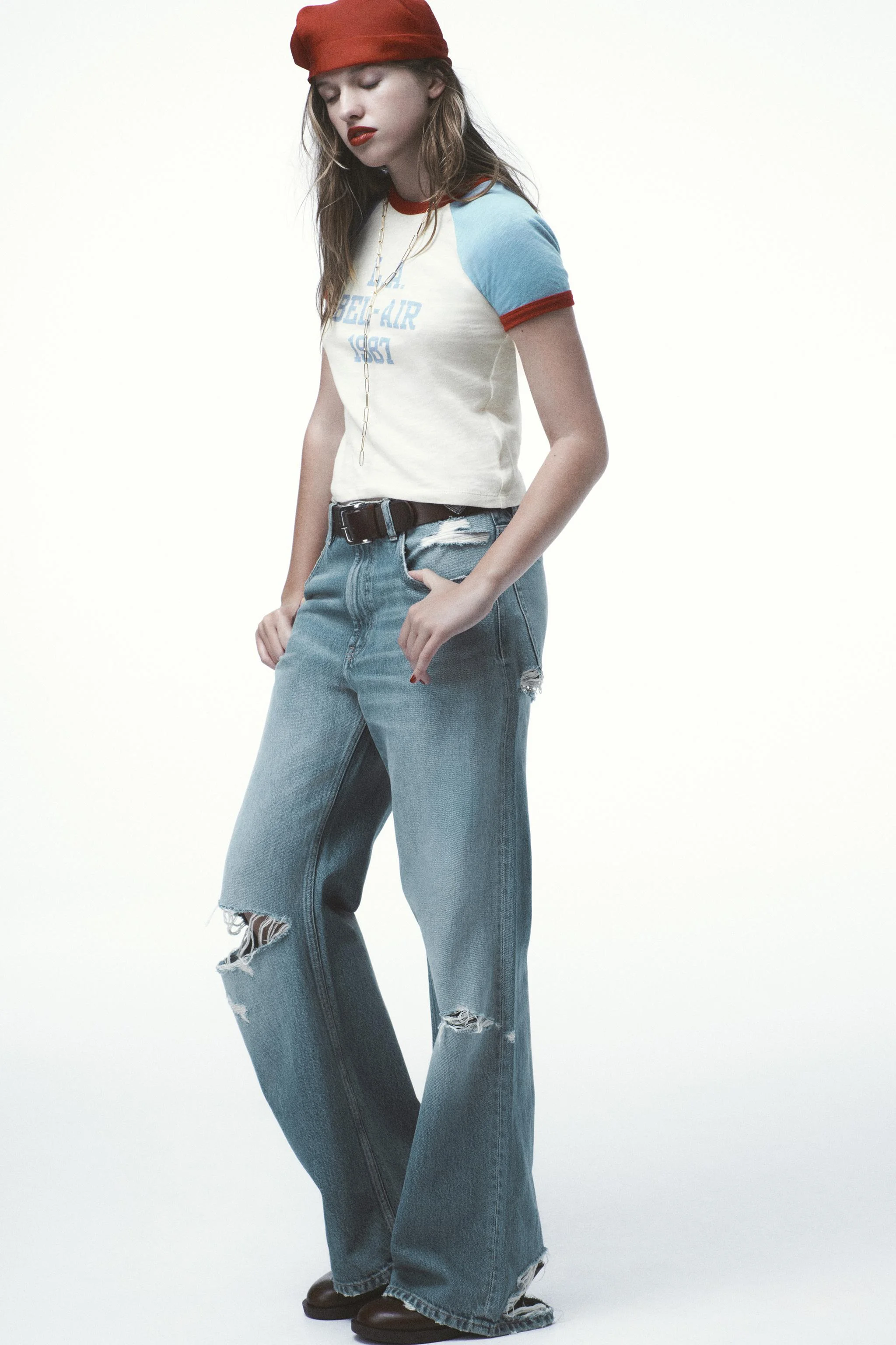 شلوار جین مدل Boyfriend با فاق متوسط و طرح پاره