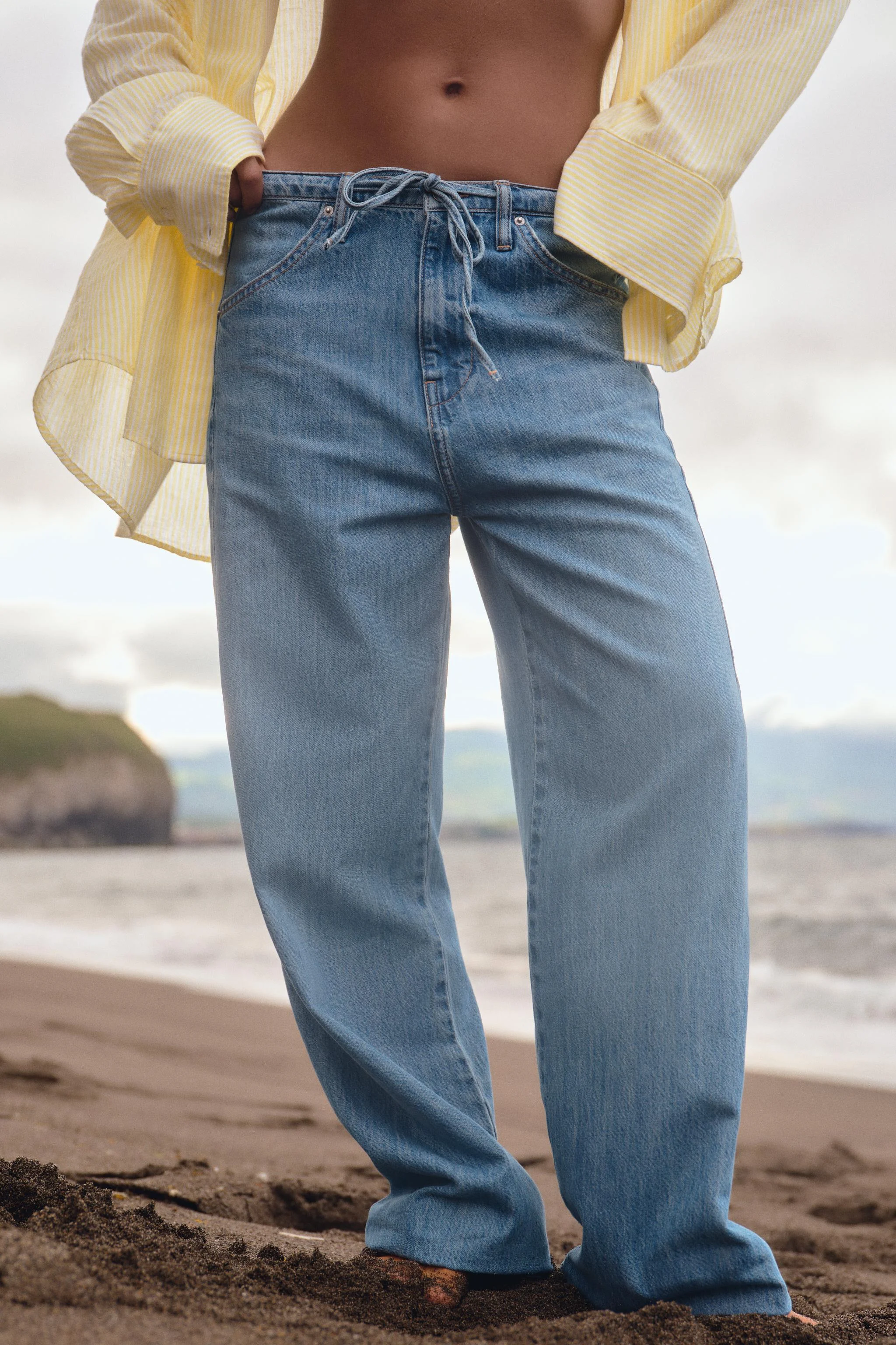 شلوار جین روان تی آر اف با بند کشی