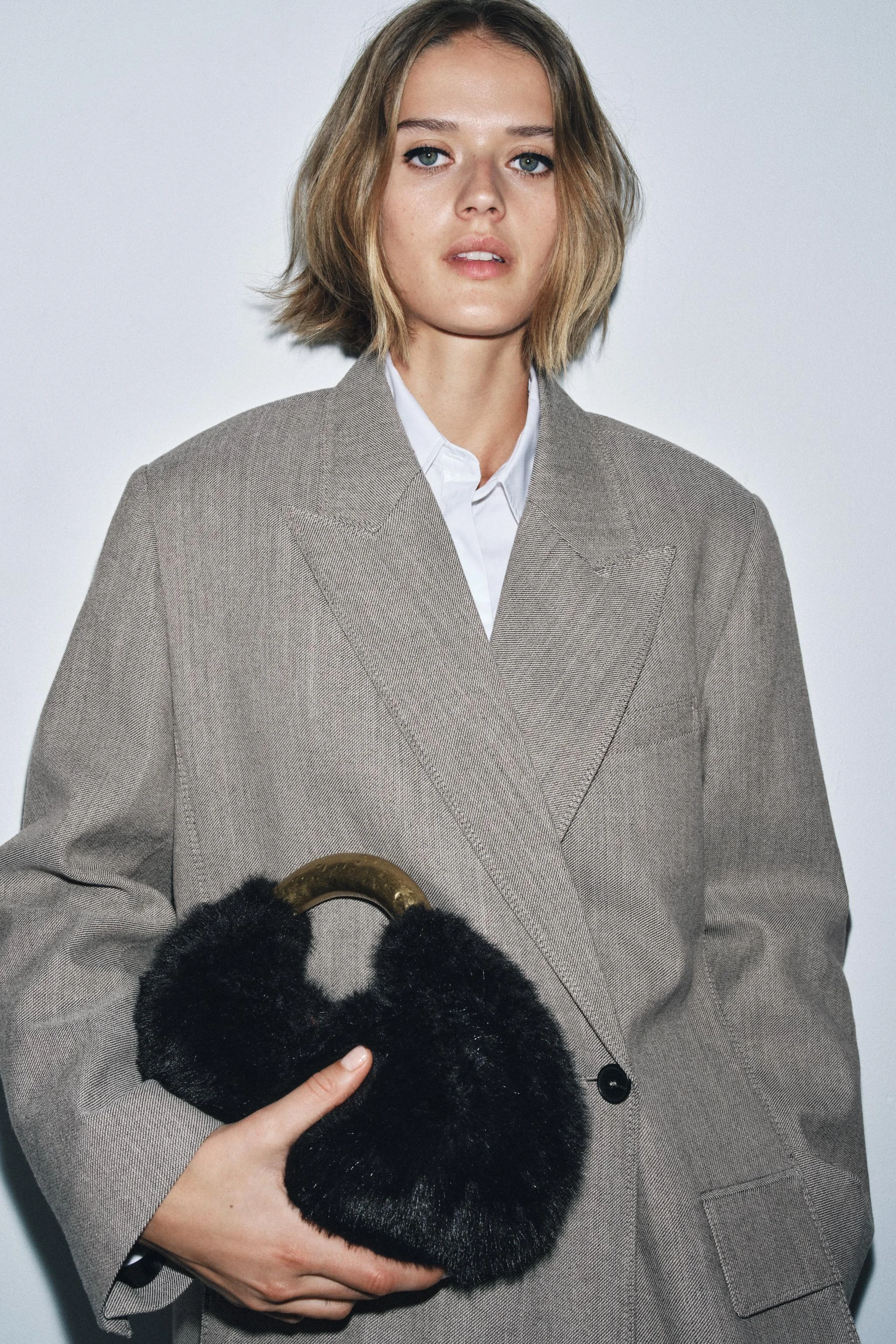 کیف دستی خز مصنوعی با دسته فلزی