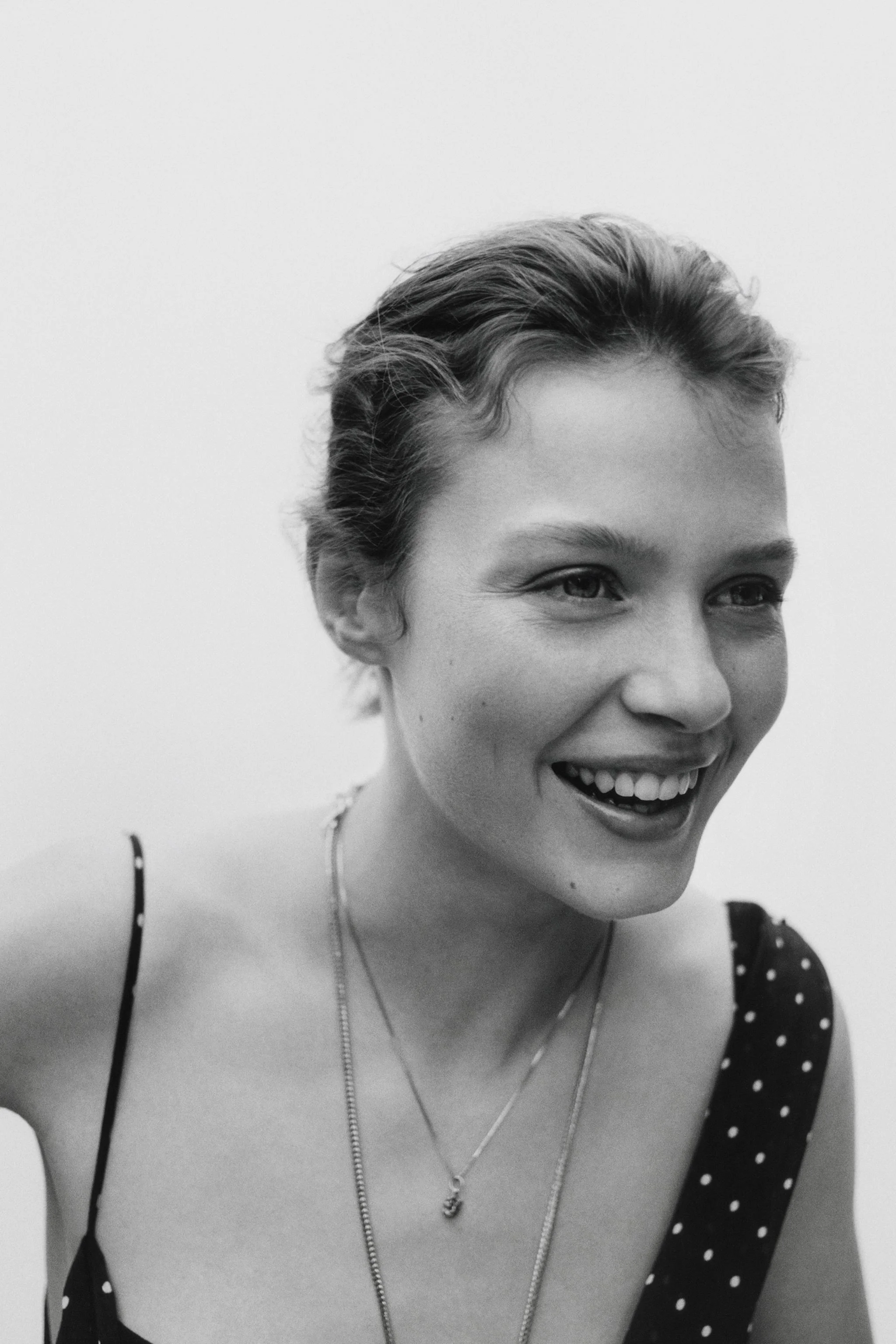 پیراهن بلند خالدار با یقه دراپه نامتقارن