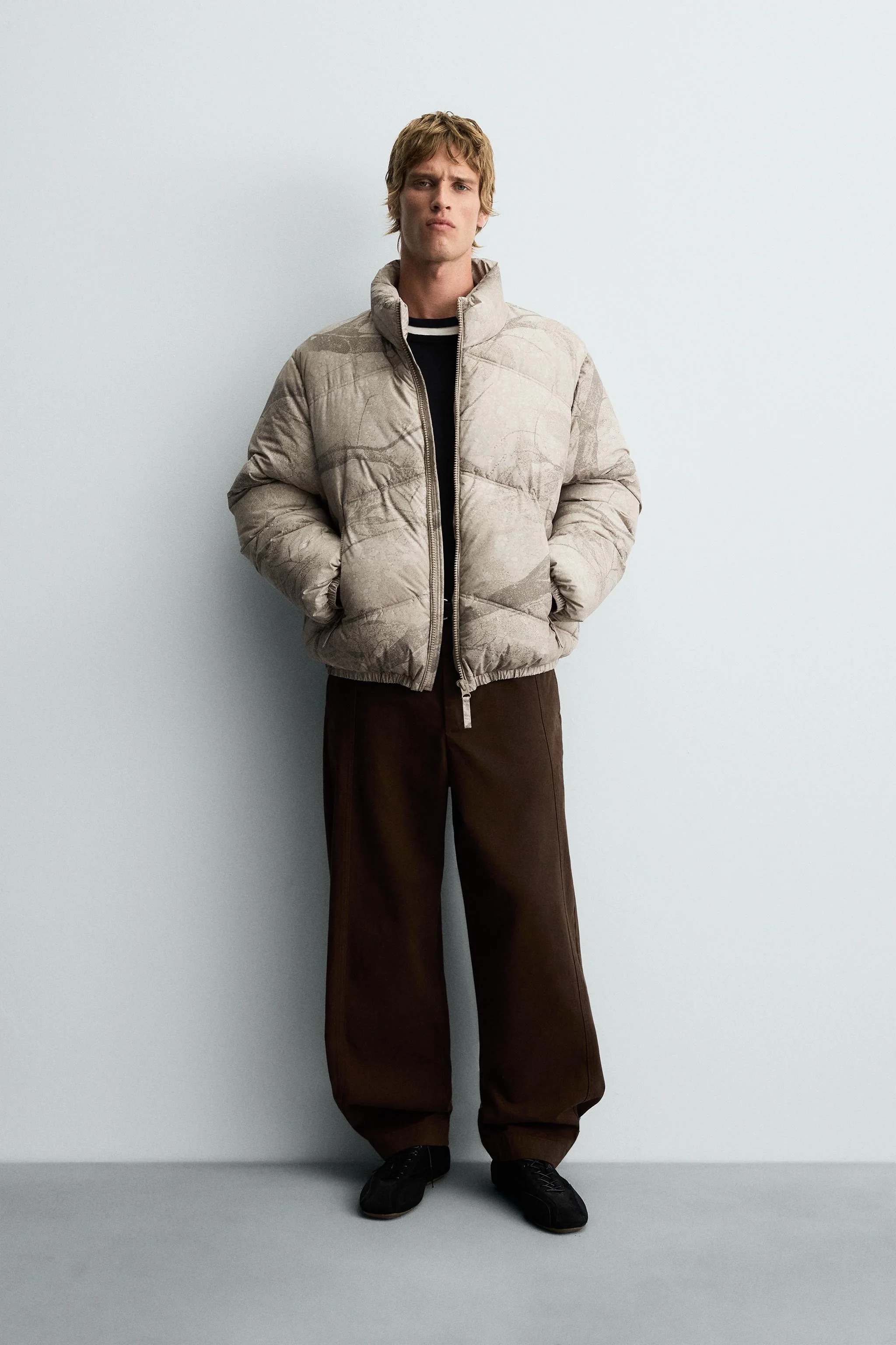 کاپشن پفی با طرح آبستره