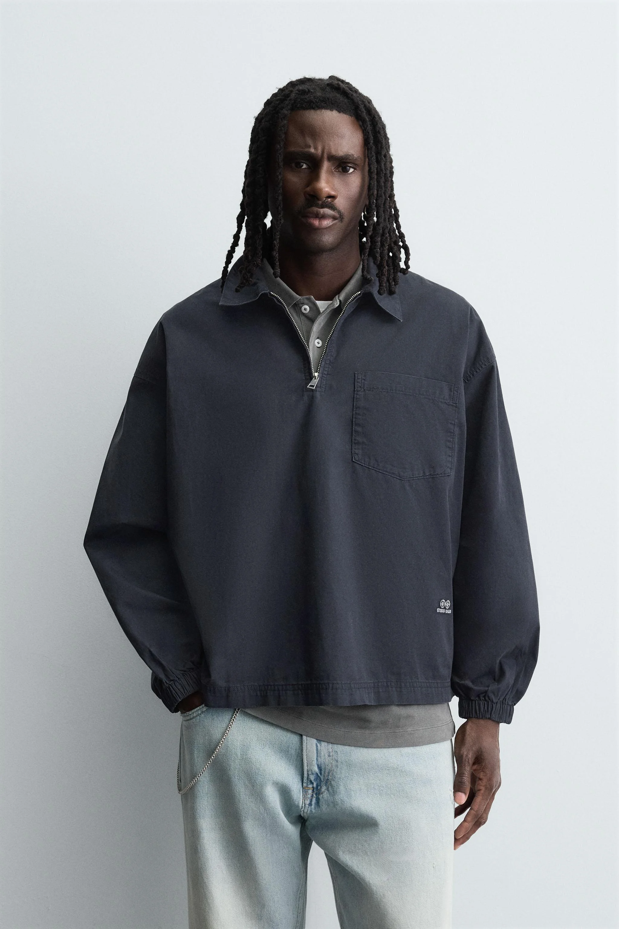 پولوشرت جین زیپ‌دار