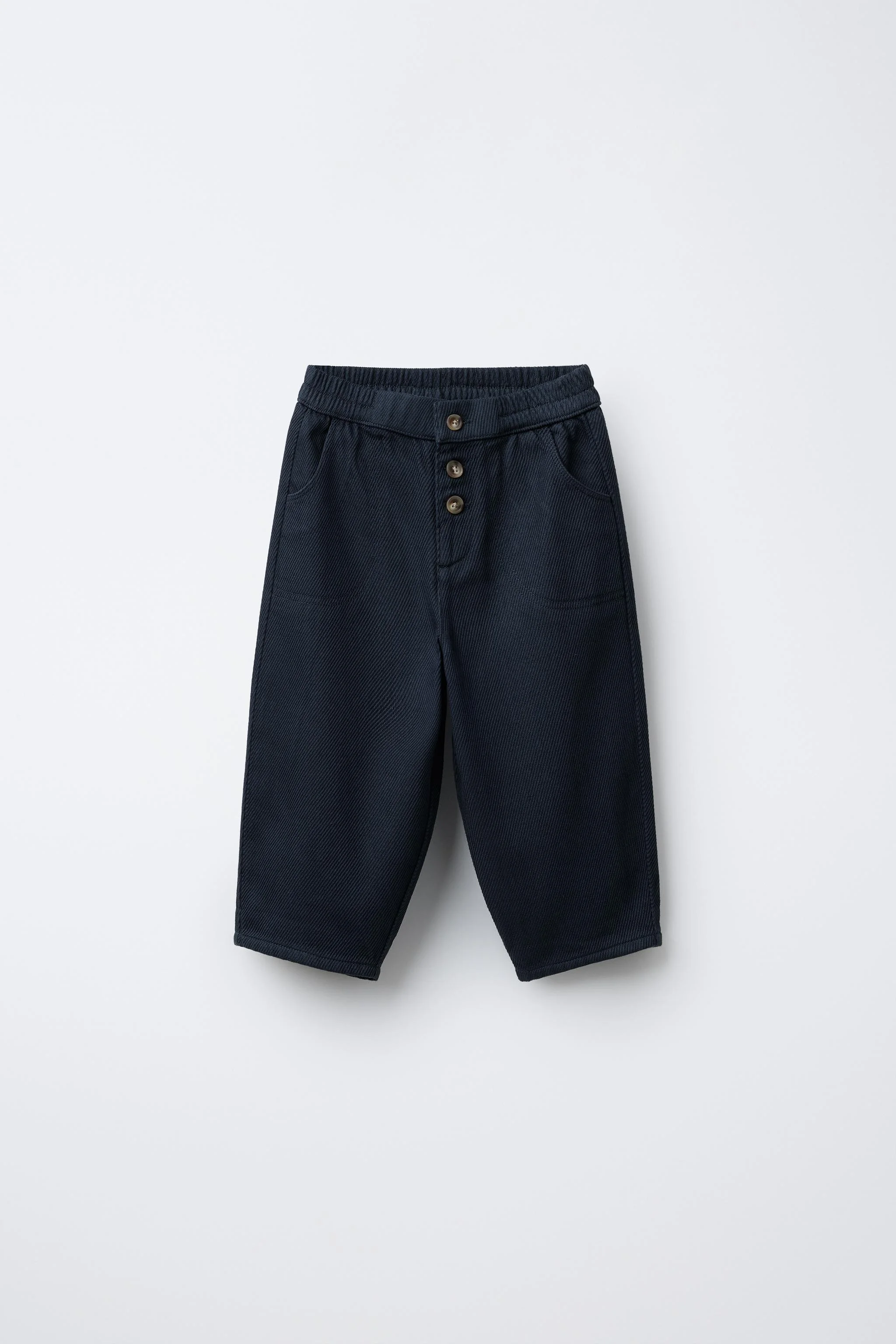 شلوار پارچه ای نرم با دکمه