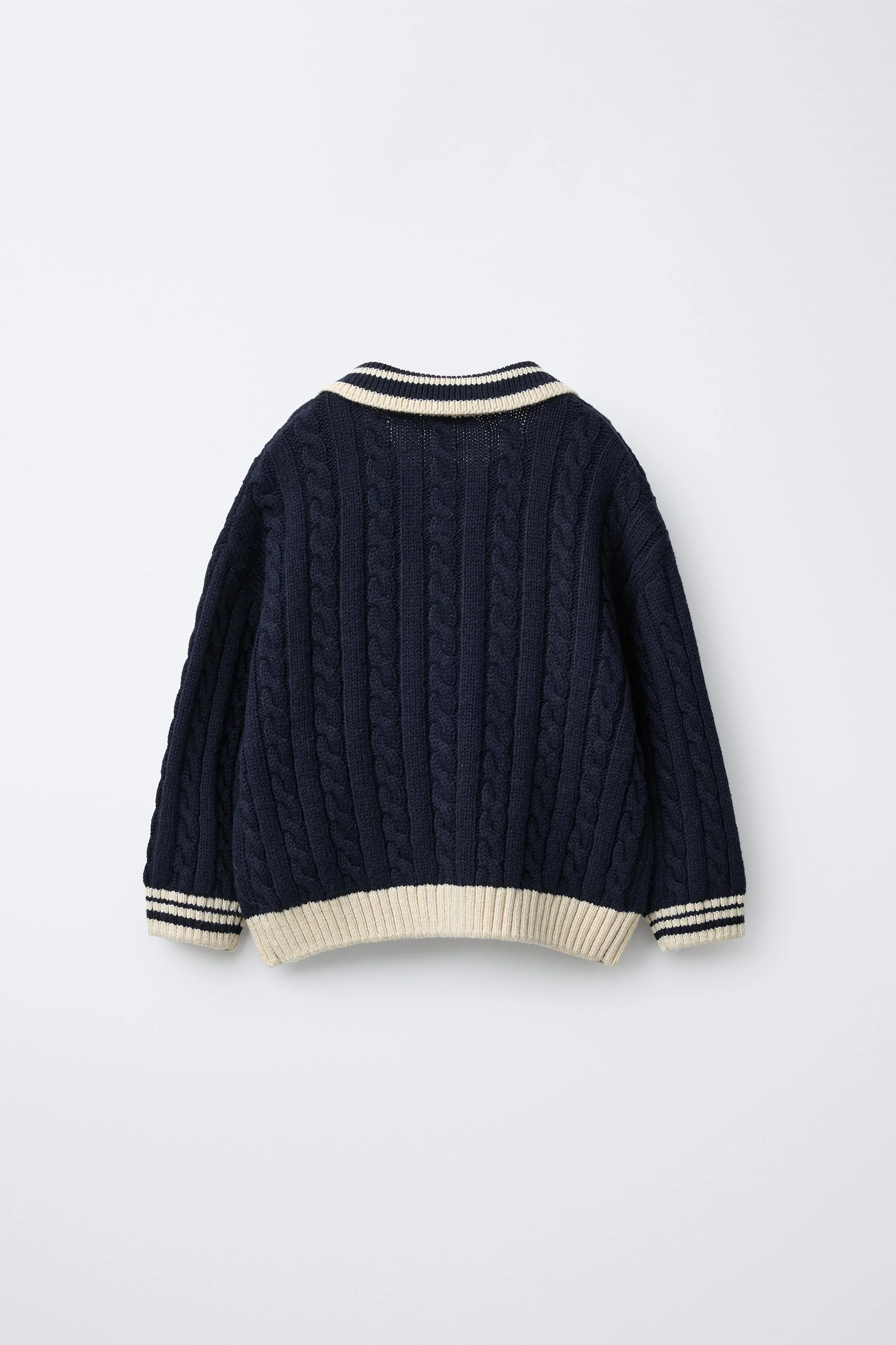 پولوشرت بافتنی آستین بلند با گلدوزی موش خرما پولوشرت بافتنی آستین بلند با گلدوزی موش خرما