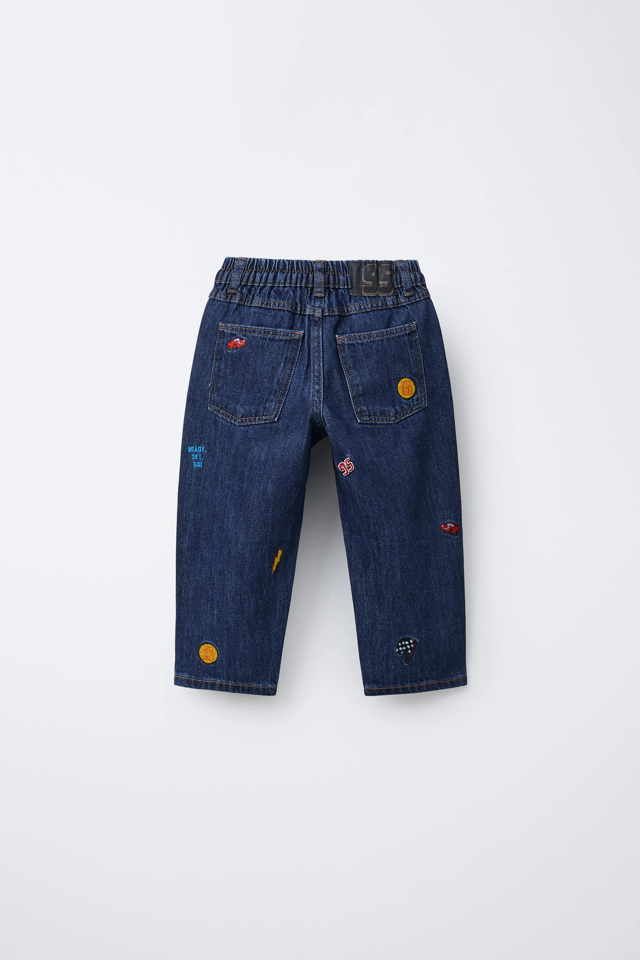 شلوار جین بگ گشاد با گلدوزی طرح مککوئین © دیزنی شلوار جین بگ گشاد با گلدوزی طرح مککوئین © دیزنی