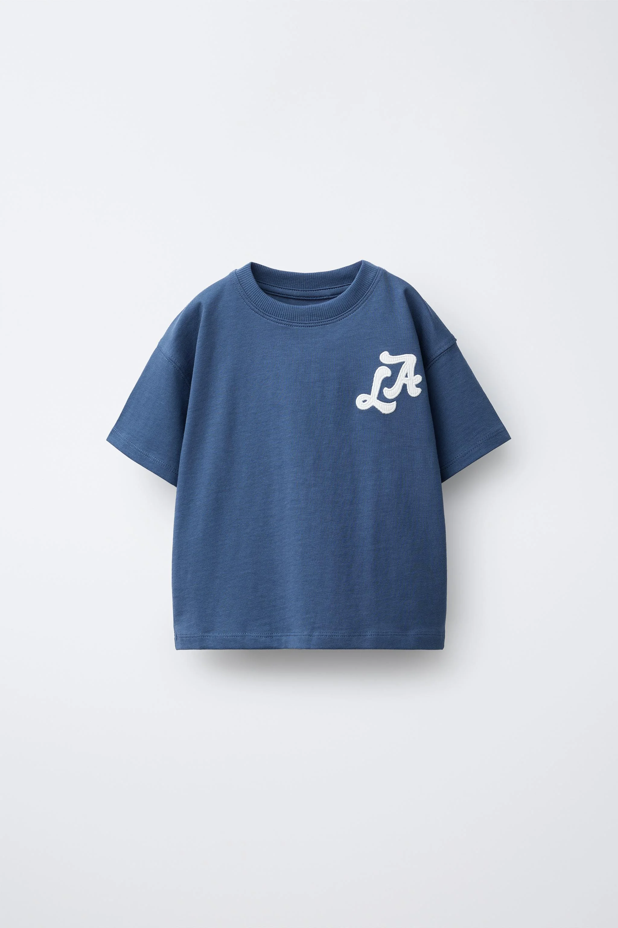 تی شرت گلدوزی شده طرح شهر