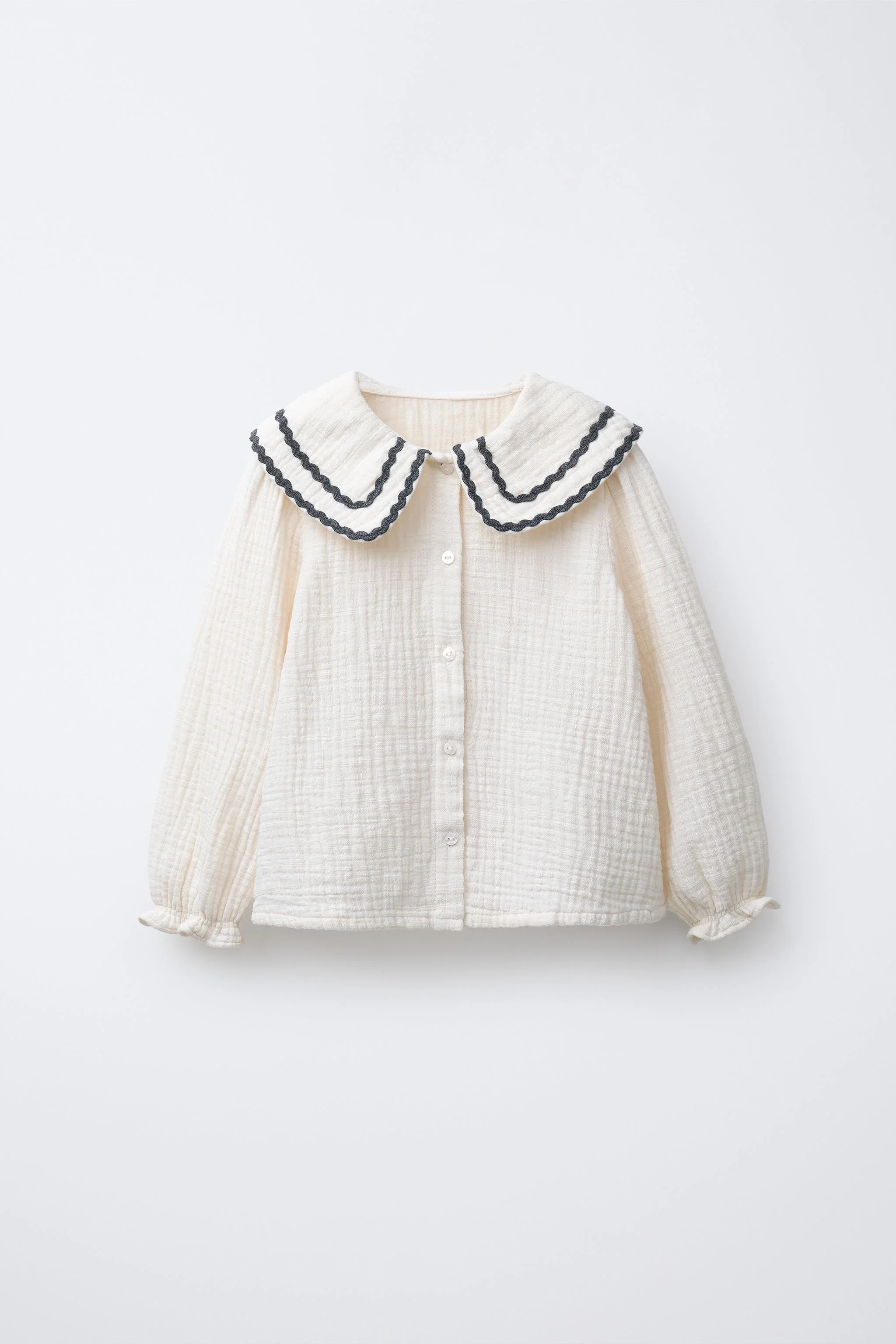 پیراهن با بافت و تزیینات موجی متضاد