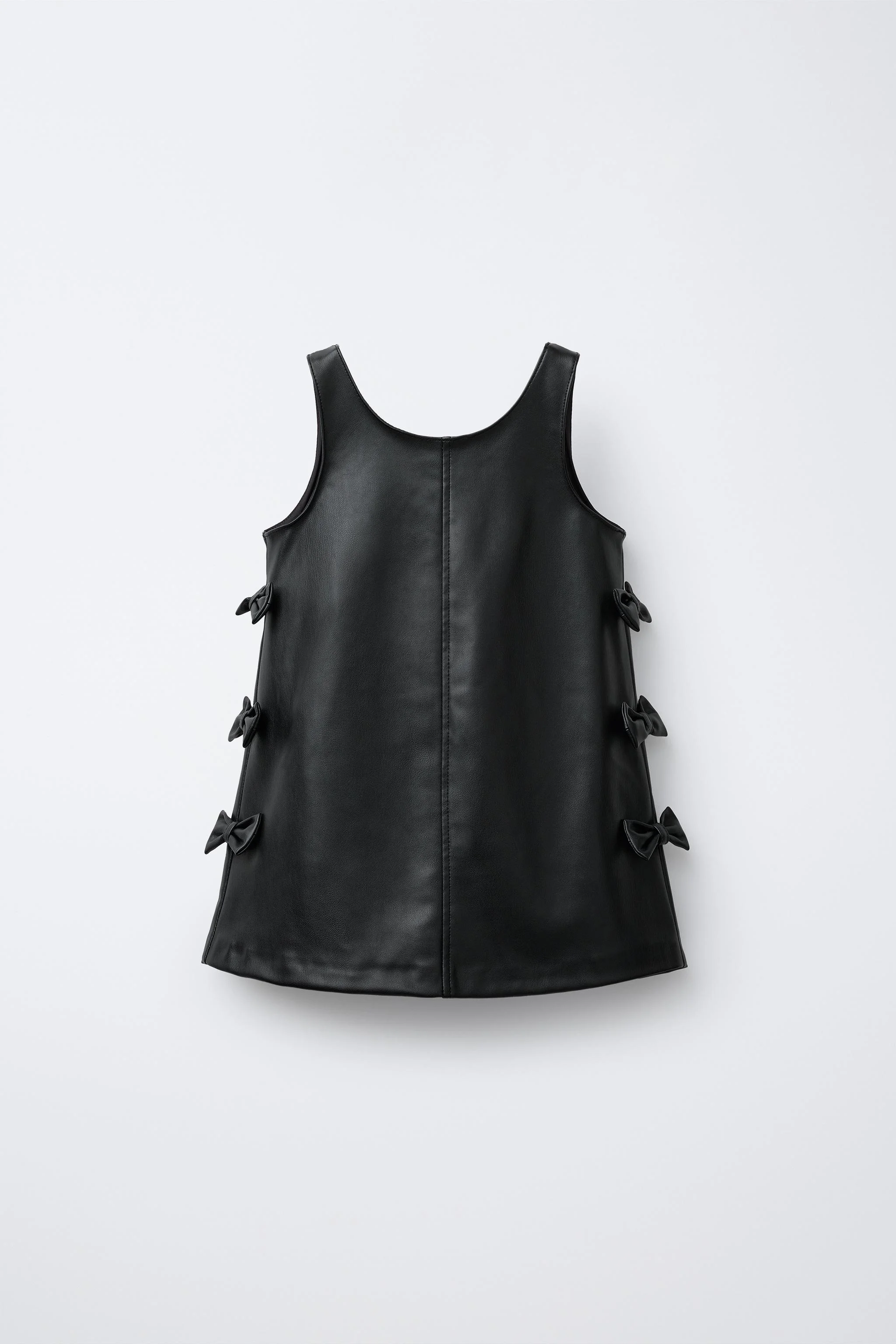 پیراهن پیشبندی چرم مصنوعی با پاپیون