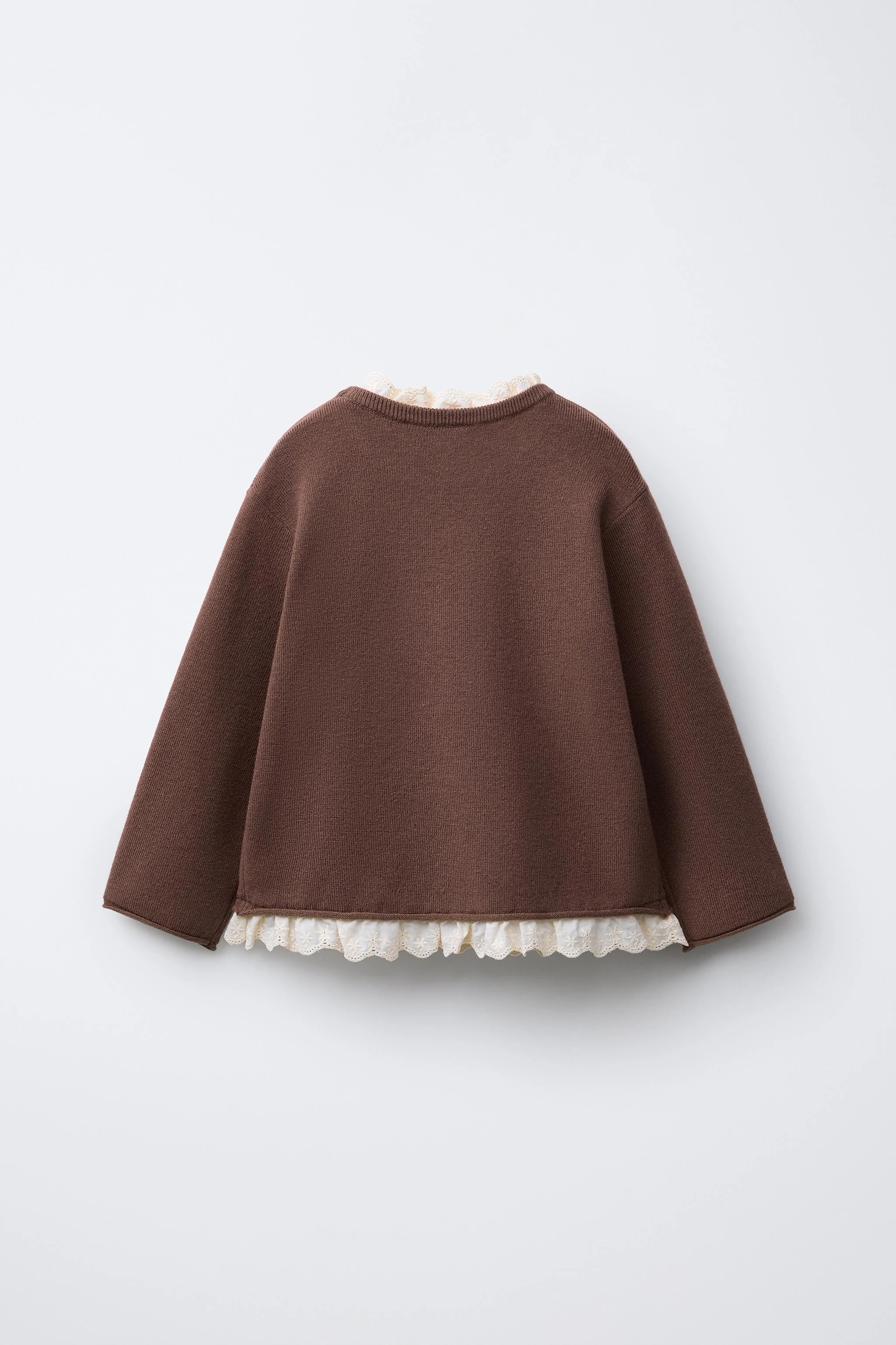 پلیور بافتنی با گلدوزی و تزیینات گیپور پلیور بافتنی با گلدوزی و تزیینات گیپور