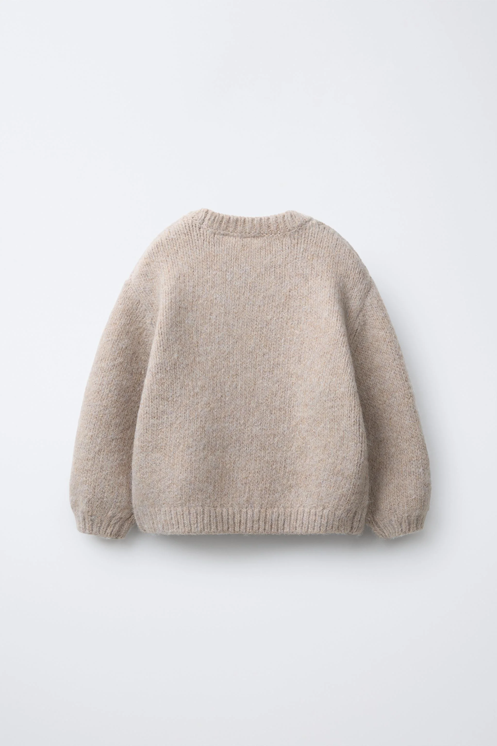 پلیور بافت ساده با یقه گرد و آستین بلند پلیور بافت ساده با یقه گرد و آستین بلند