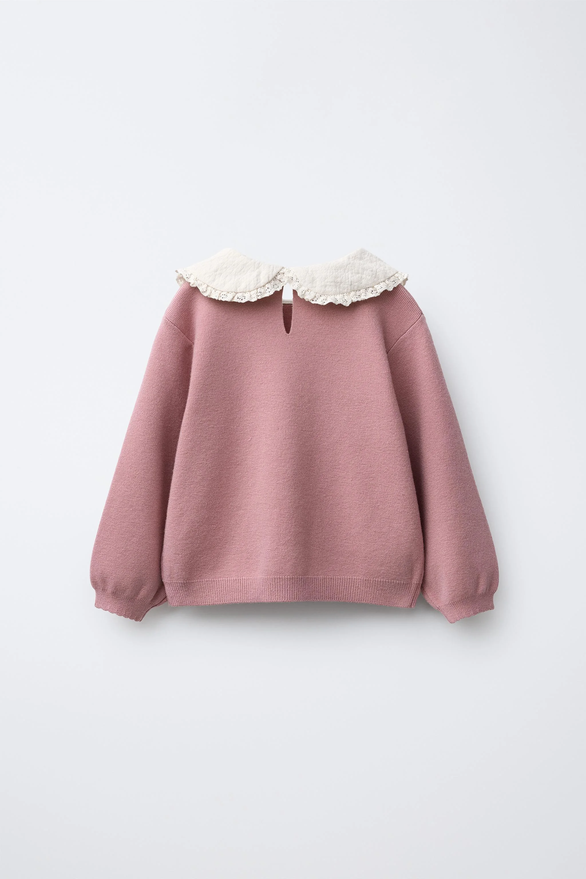 پلیور بافتنی با یقه پیتر پن و طرح گل پلیور بافتنی با یقه پیتر پن و طرح گل