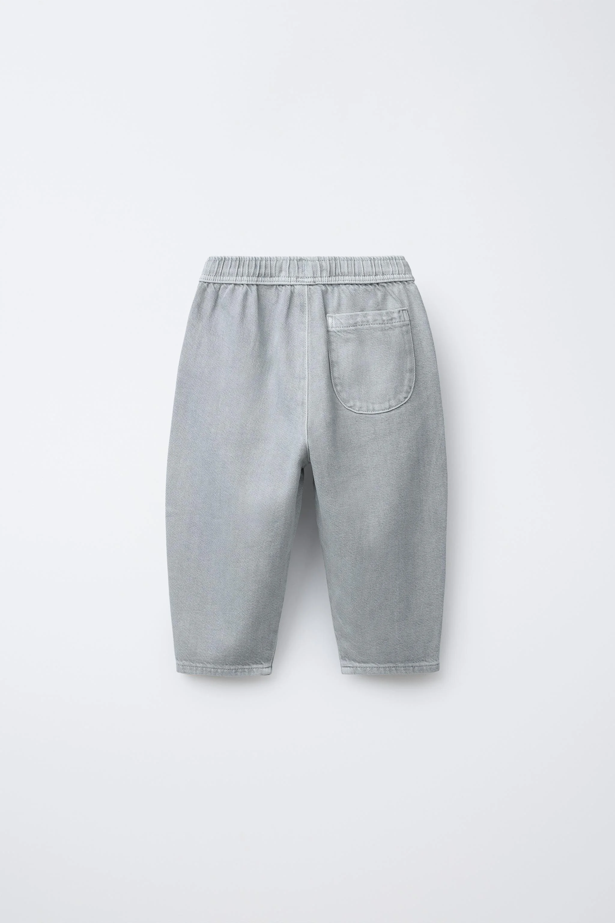 شلوار بالونی با اثر شسته شده و کمر کشی بند دار شلوار بالونی با اثر شسته شده و کمر کشی بند دار