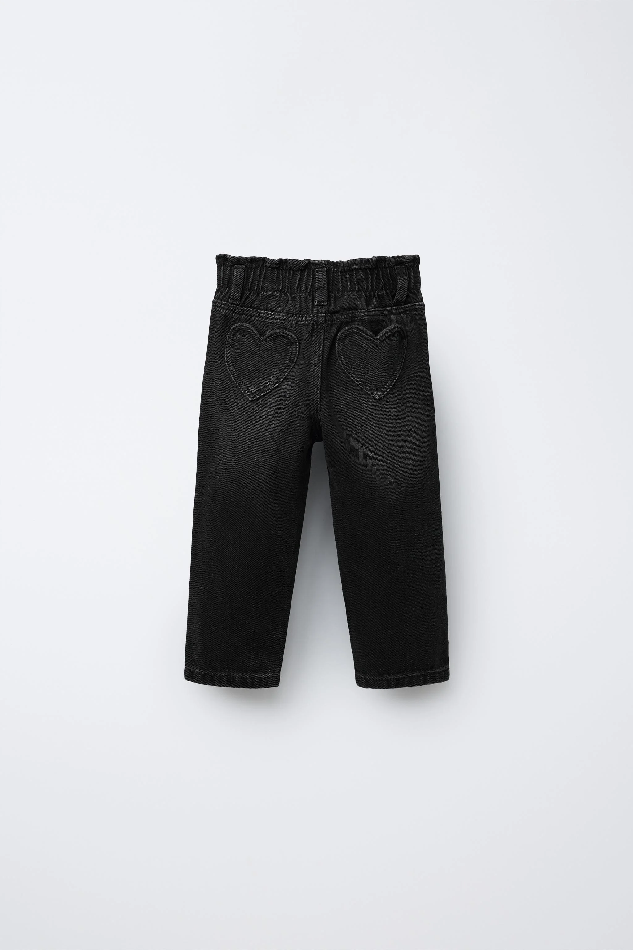 شلوار جین کاغذی با کمر کشی و جیب های قلبی شلوار جین کاغذی با کمر کشی و جیب های قلبی