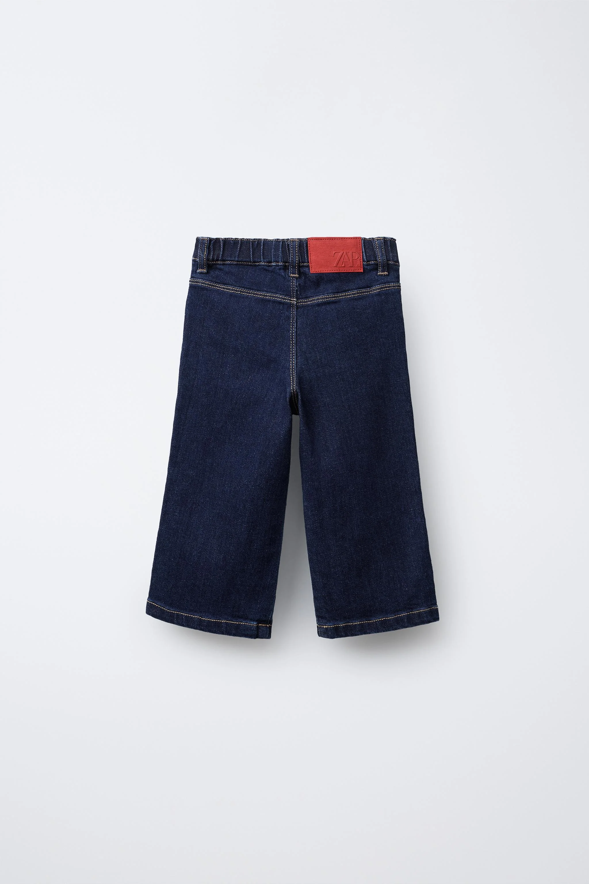 شلوار جین مدل ملوانی با جیب های گلدوزی شده شلوار جین مدل ملوانی با جیب های گلدوزی شده