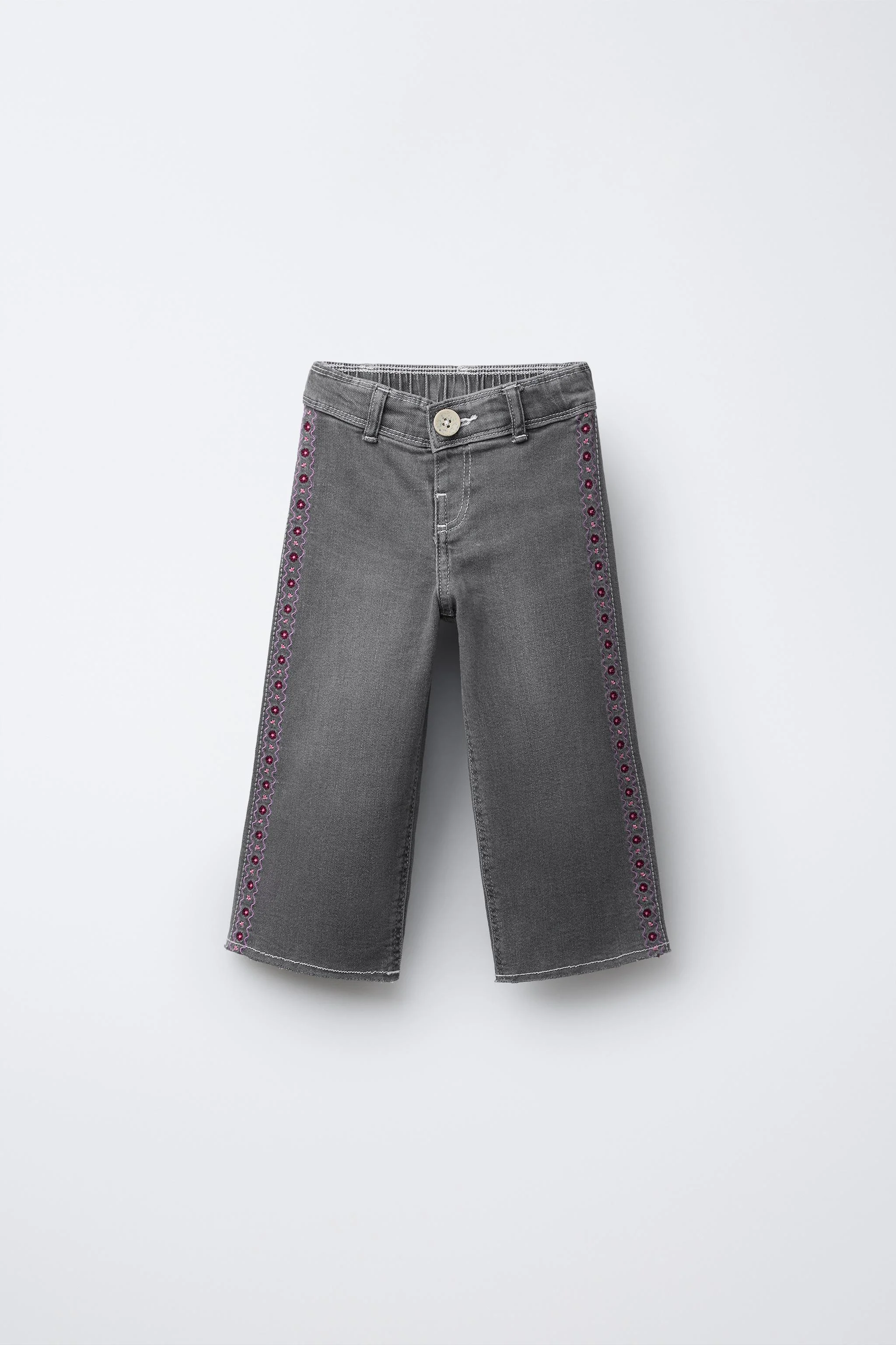 شلوار جین مدل ملوان با گلدوزی گل شلوار جین مدل ملوان با گلدوزی گل