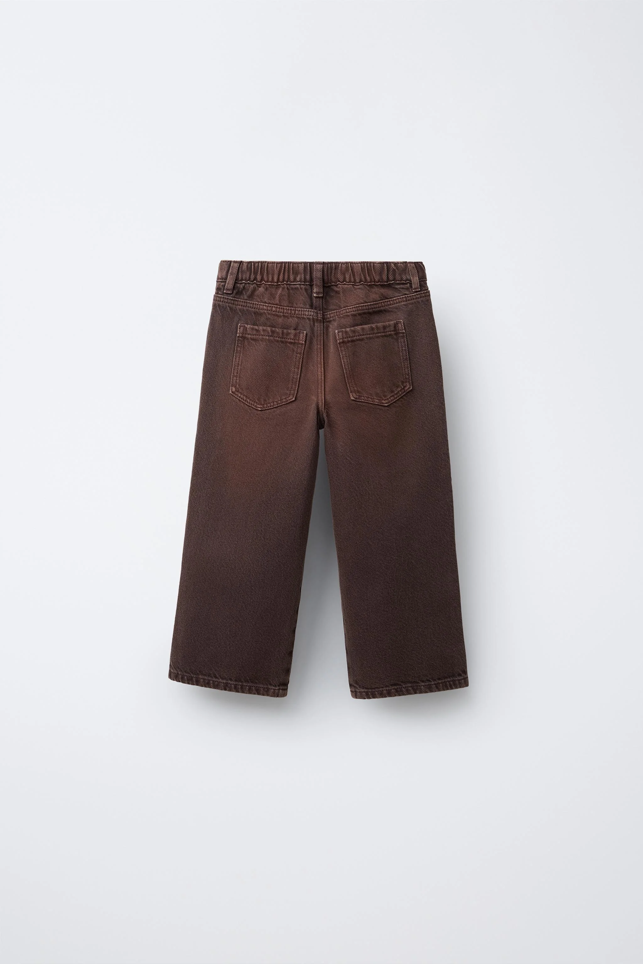 شلوار جین پاچه گشاد با کمر ضربدری شلوار جین پاچه گشاد با کمر ضربدری