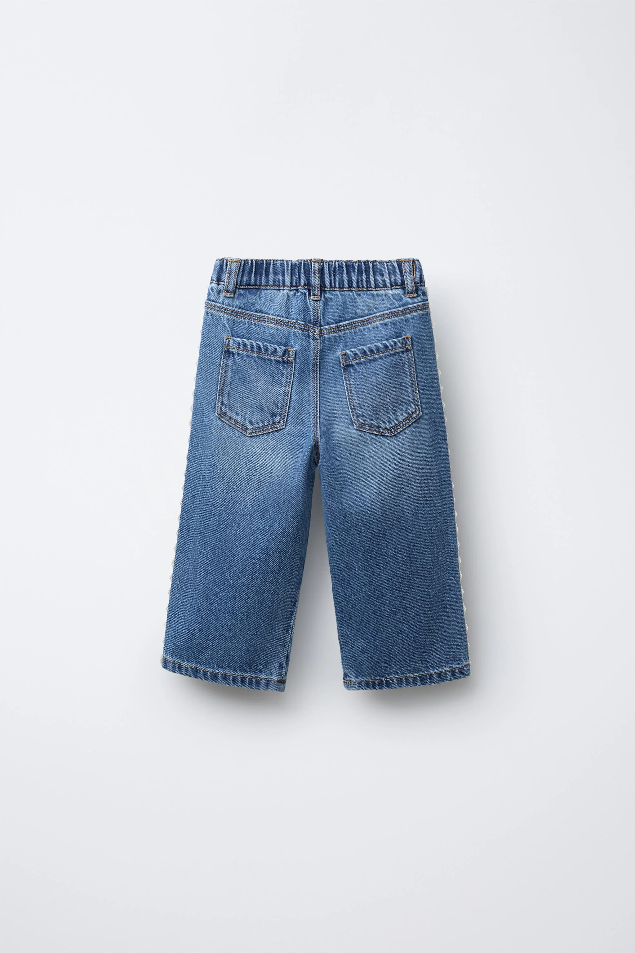 شلوار جین دامن-شلواری با تزیینات گیپور شلوار جین دامن-شلواری با تزیینات گیپور