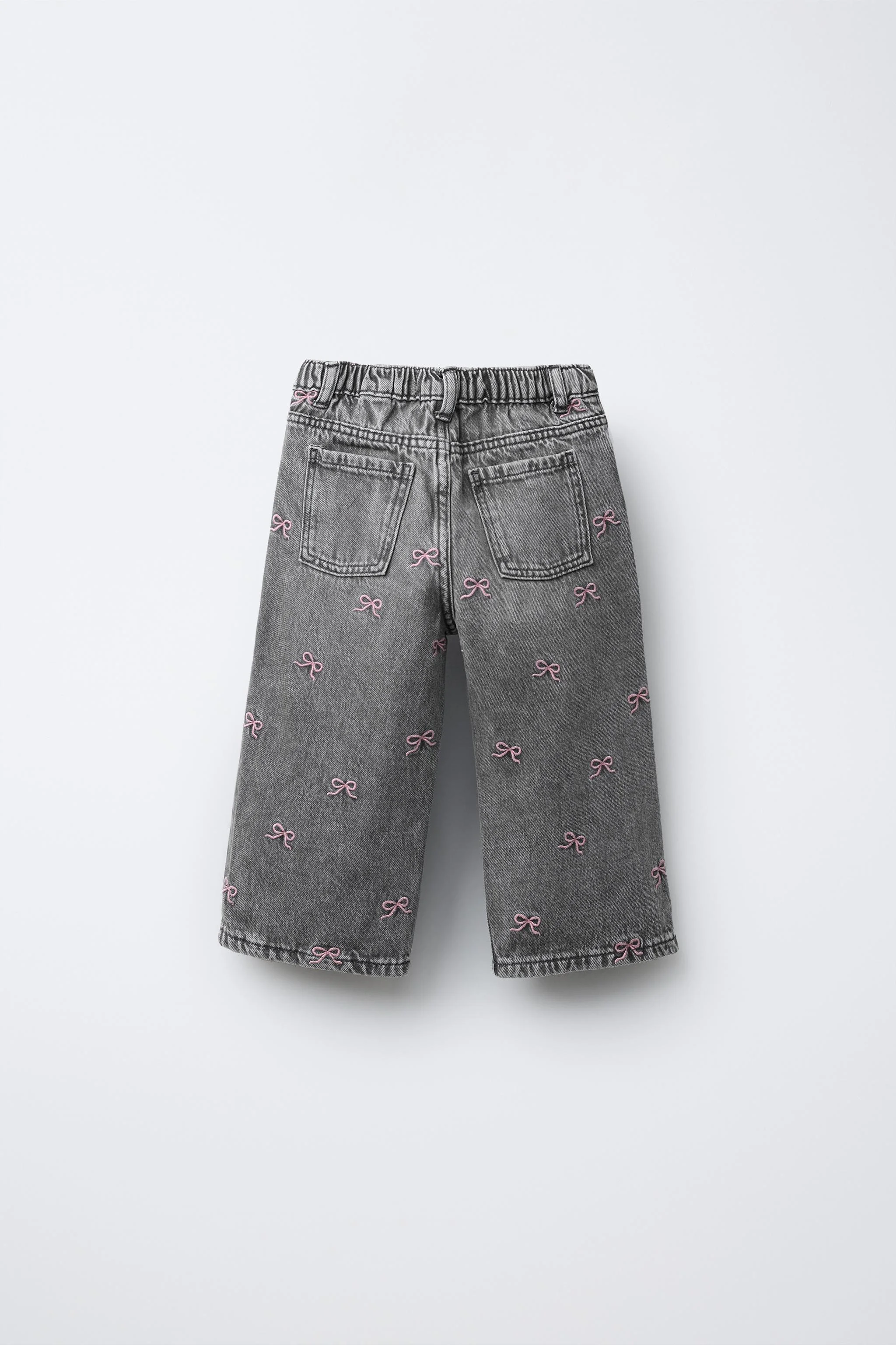 شلوار جین گشاد گلدوزی شده با پاپیون شلوار جین گشاد گلدوزی شده با پاپیون