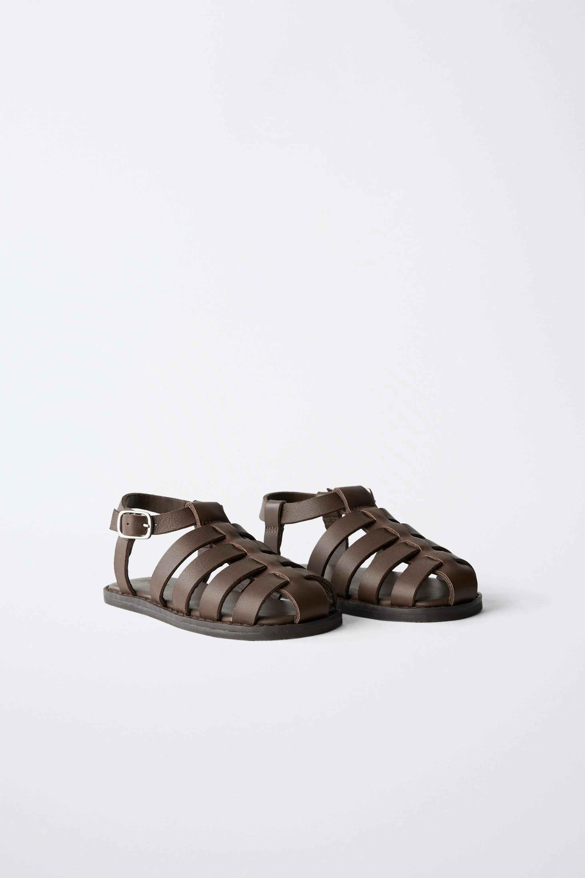 صندل های قفسی چرمی سگک دار صندل های قفسی چرمی سگک دار