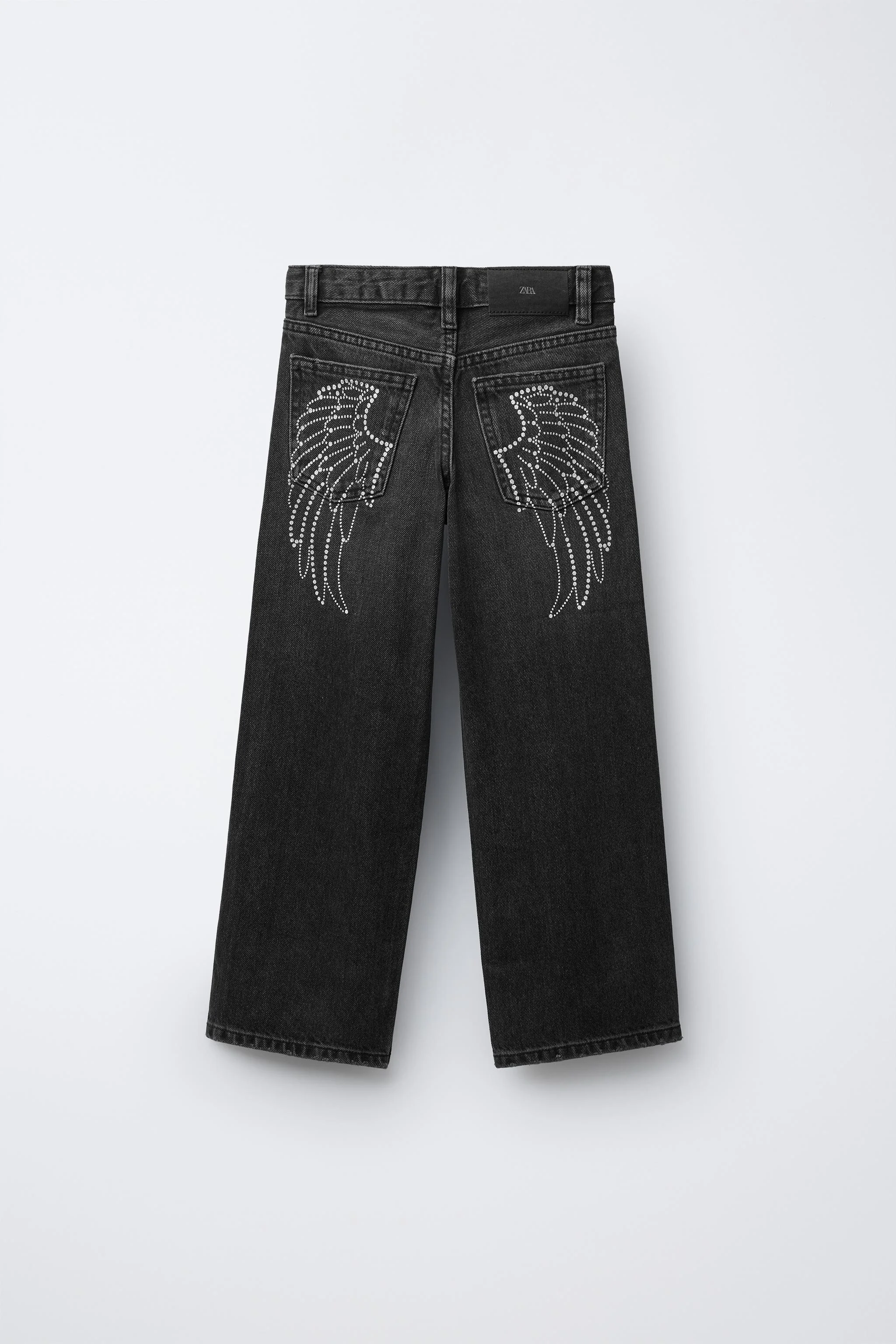 شلوار جین پا گشاد با طرح بال پر زرق و برق شلوار جین پا گشاد با طرح بال پر زرق و برق